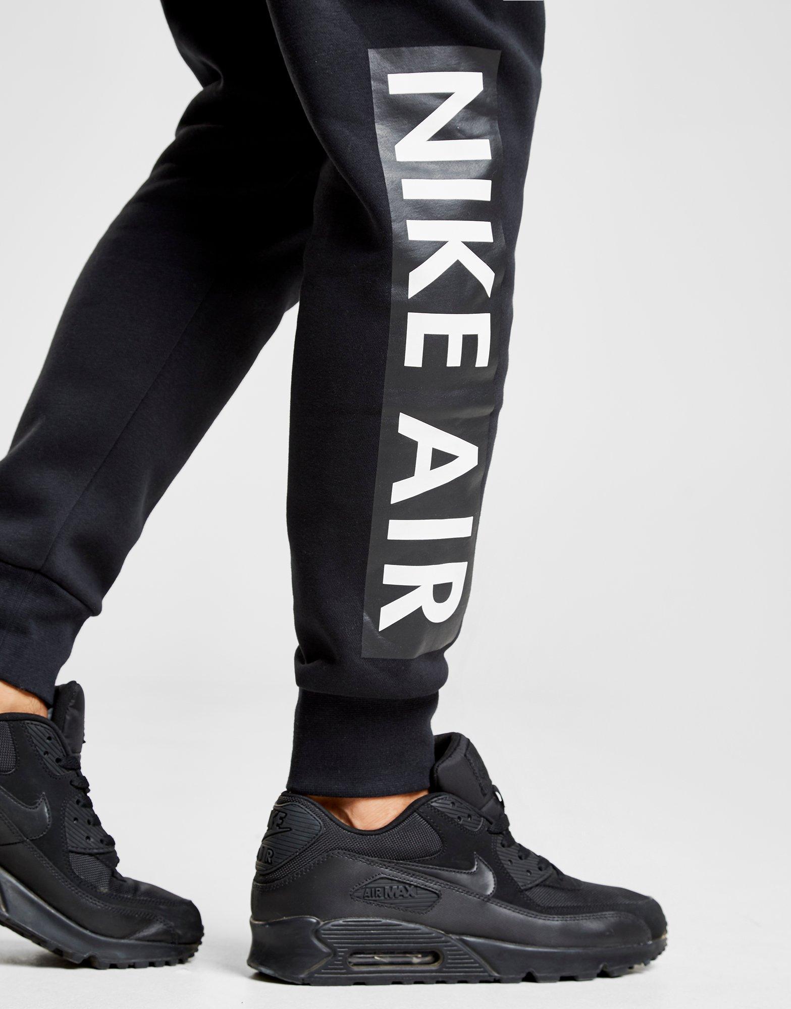 nike air track pants black