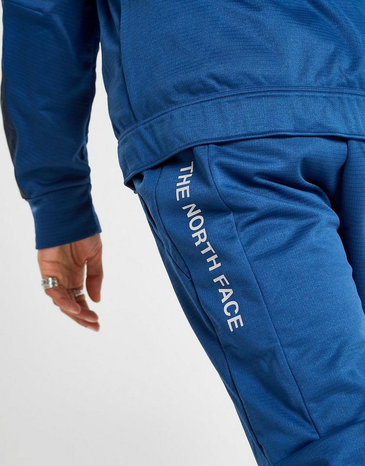 train n logo track pants