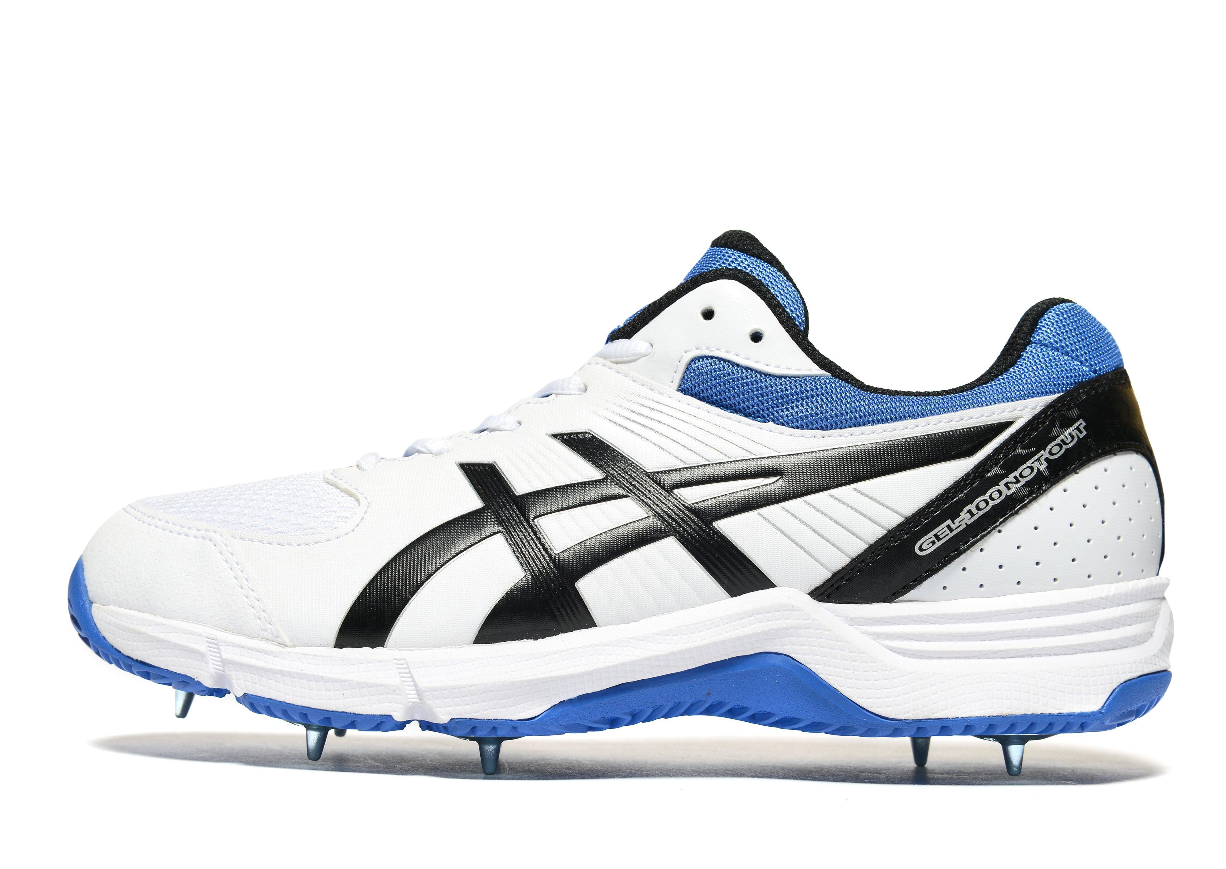 Asics Gel 100 Cricket Shoes Junior in White/Blue (Blue Asics Gel 100 Cricket Shoes Junior in White/Blue (Blue