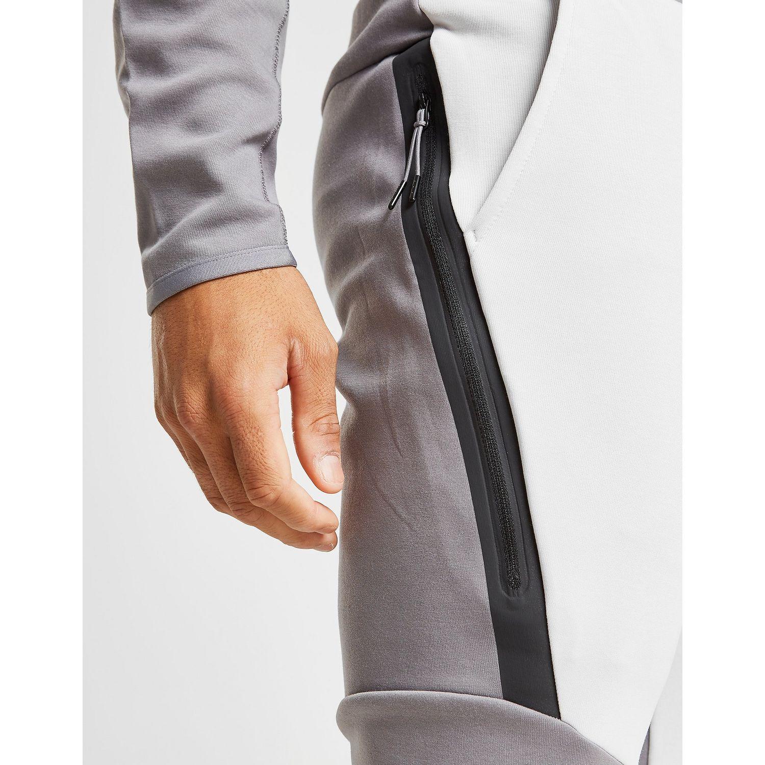 white and grey tech fleece joggers