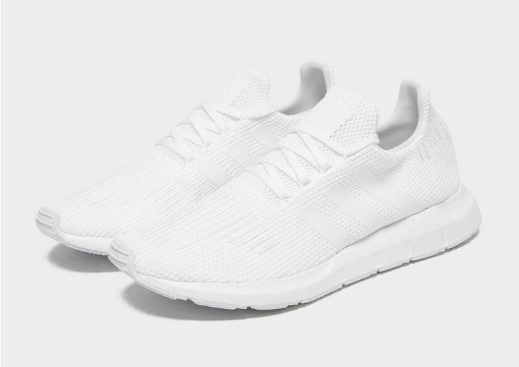 all white swift run shoes