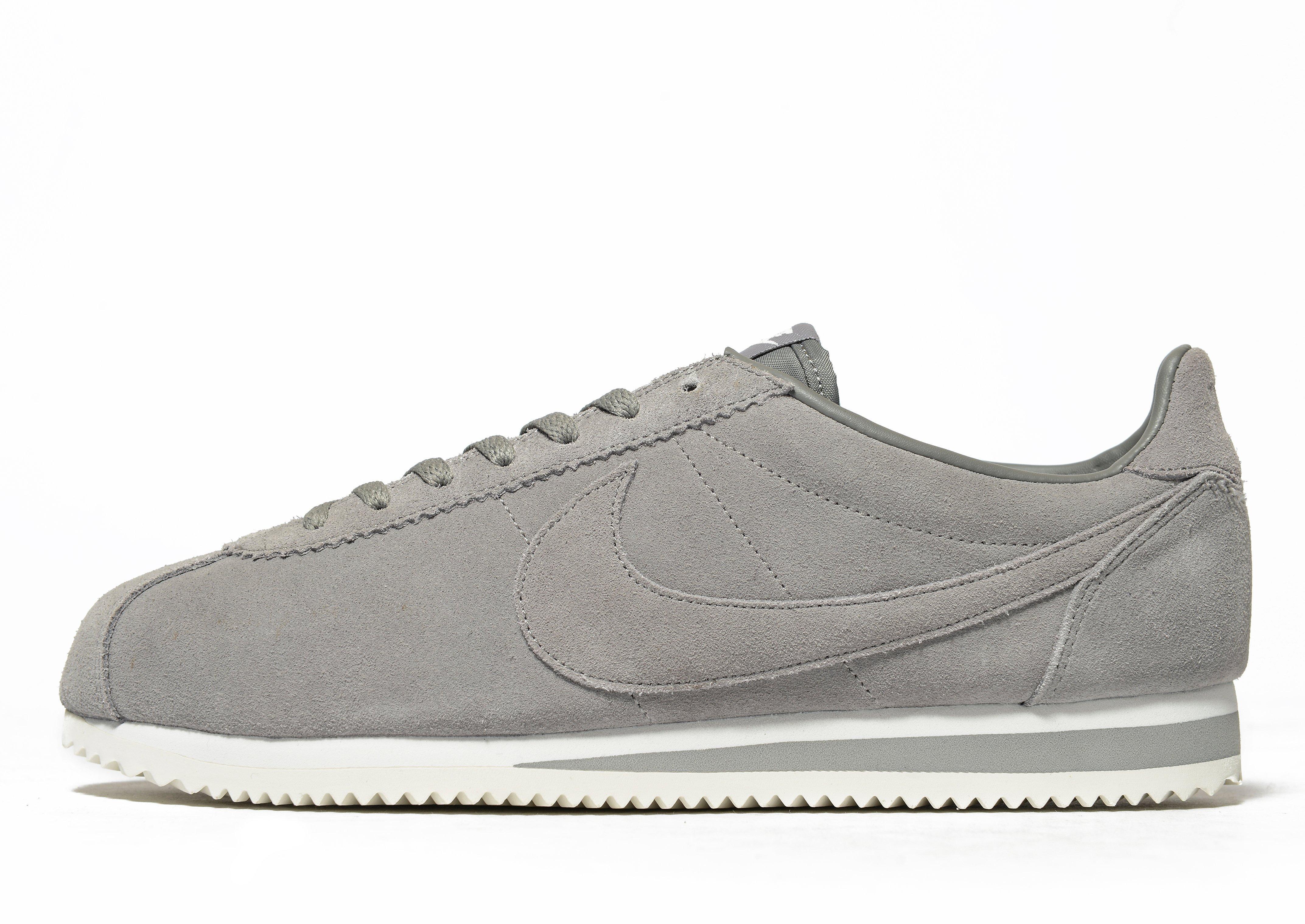 nike cortez navy suede