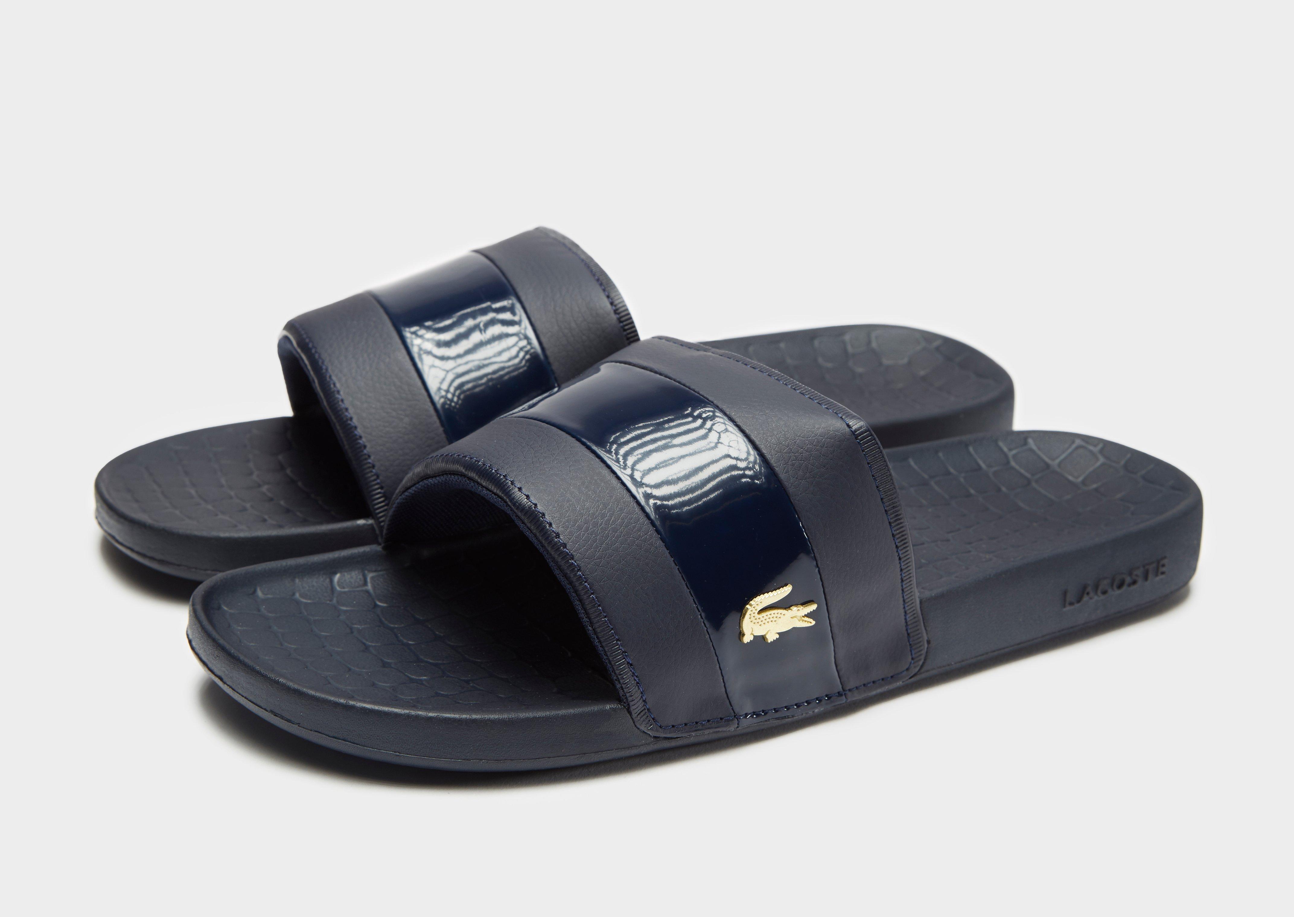 blue lacoste slides