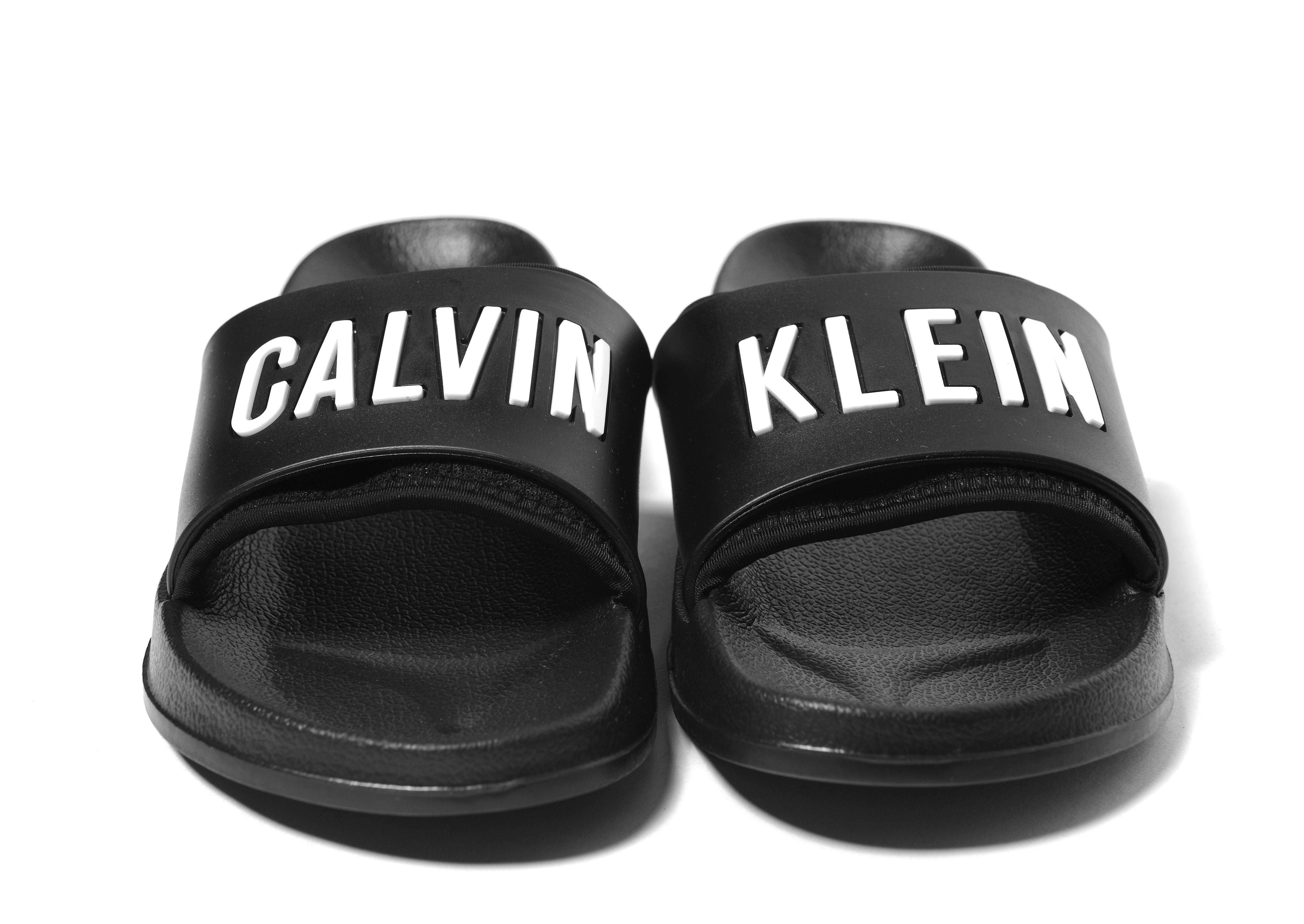 Calvin Klein Synthetic Slides in Black for Men - Lyst