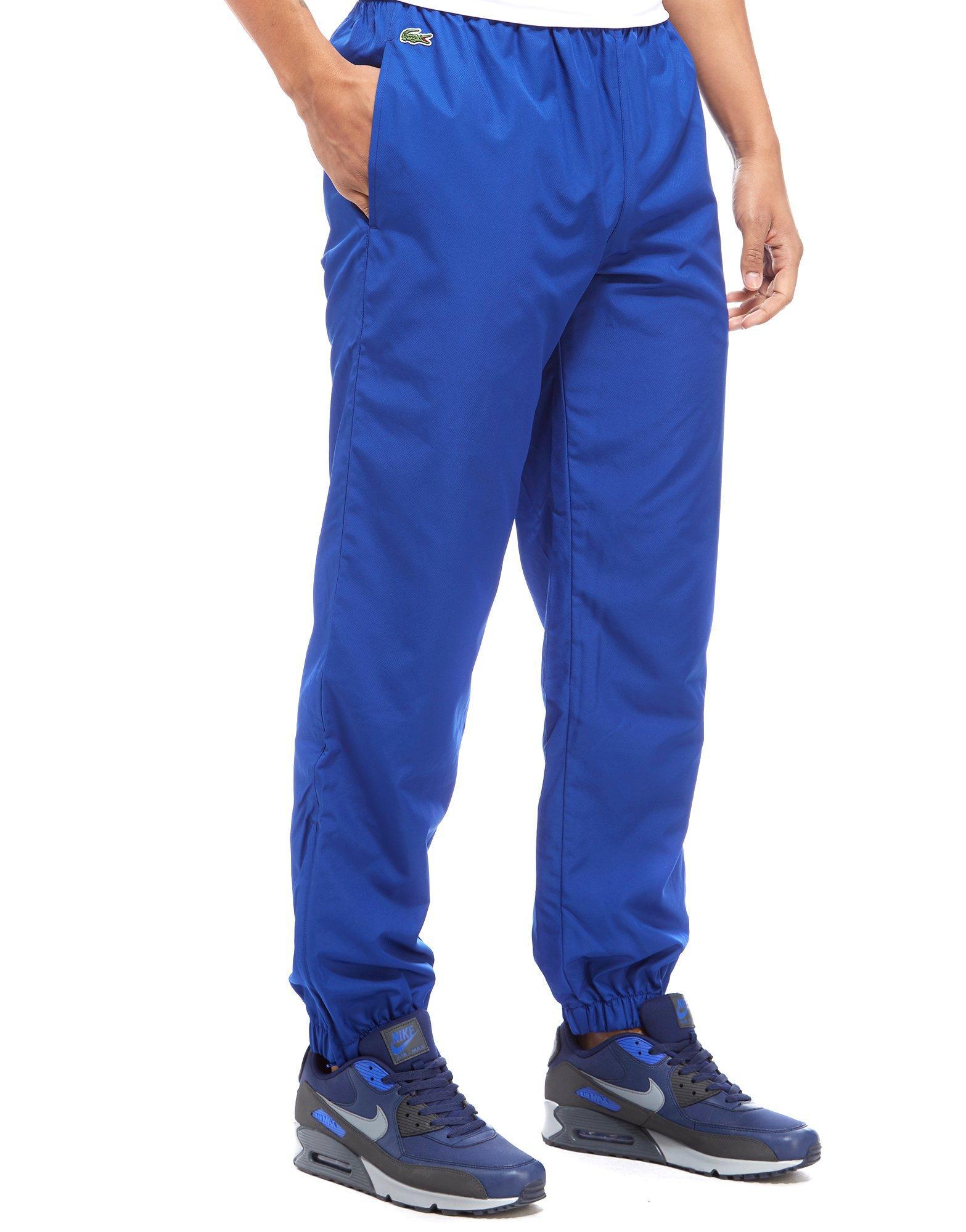 lacoste track pants blue