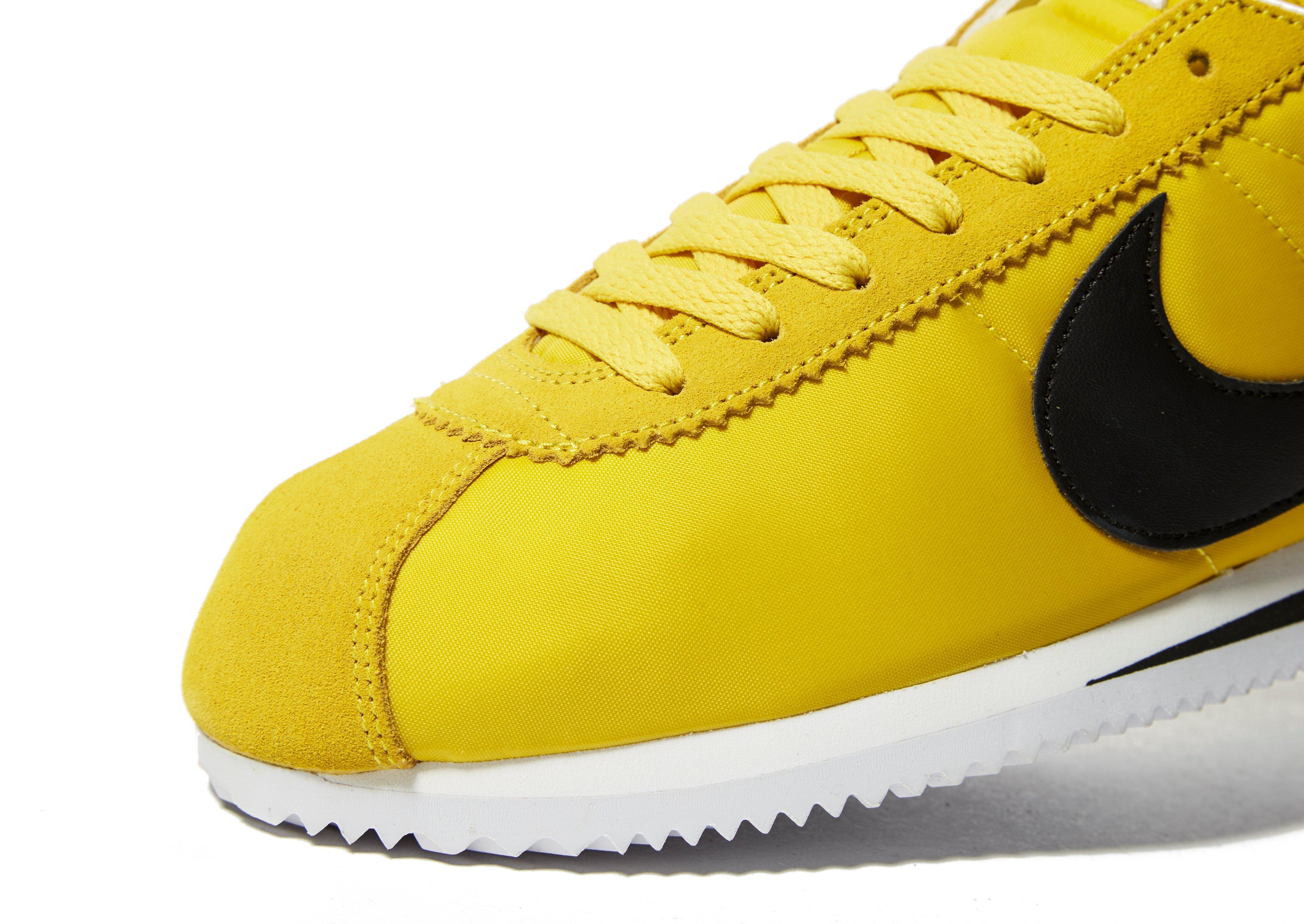 nike cortez black and yellow