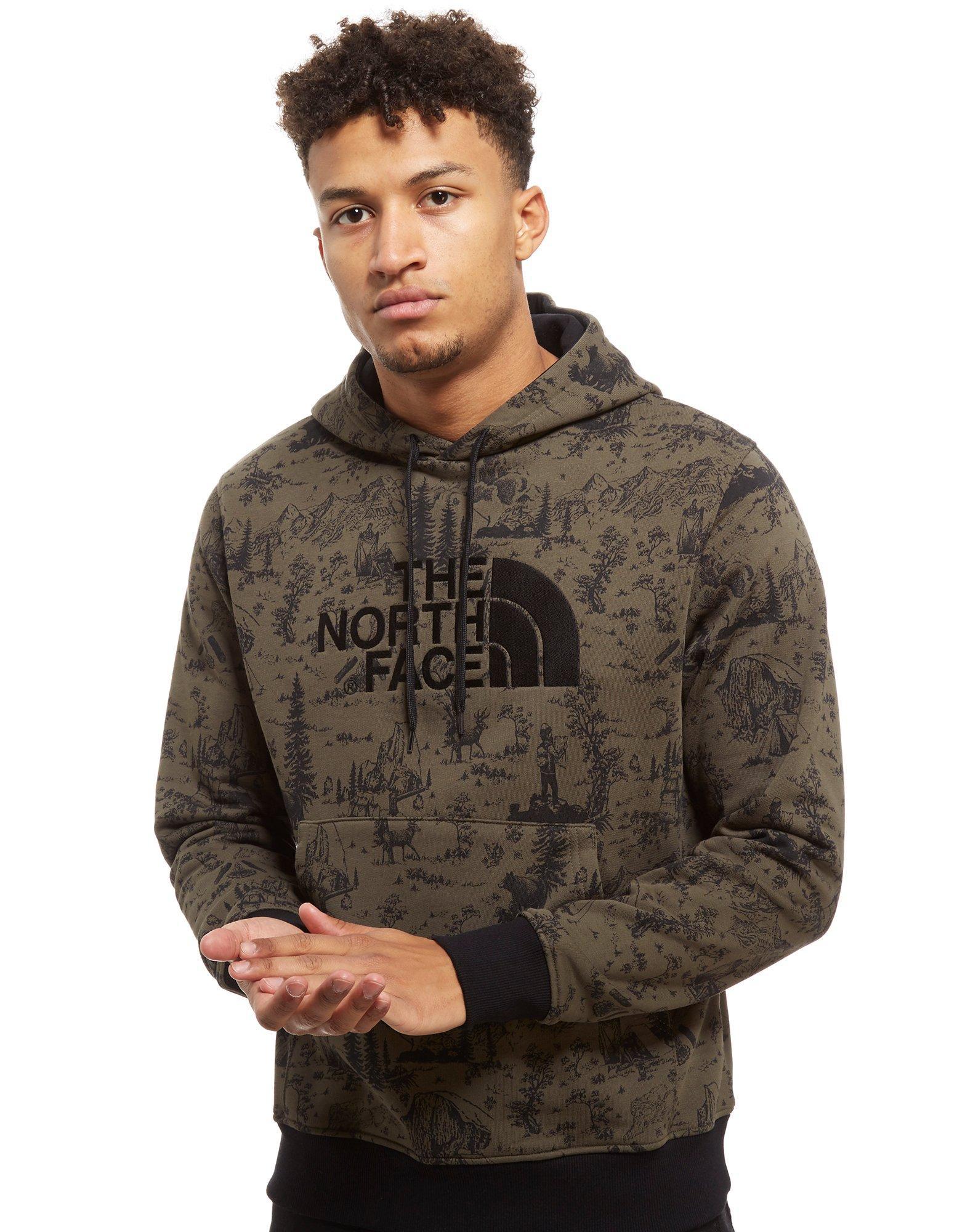 the north face all over print hoodie