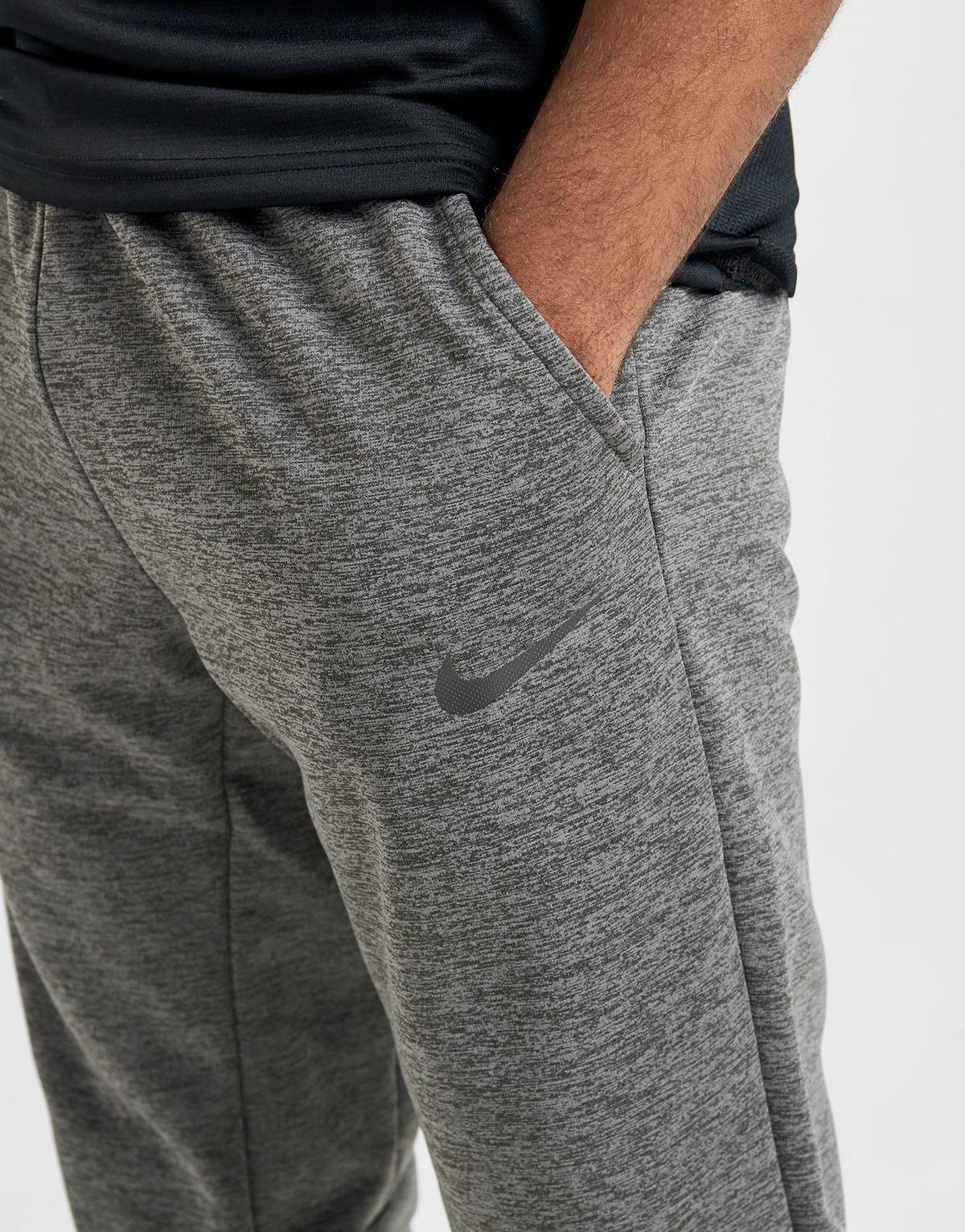 nike training therma track pants