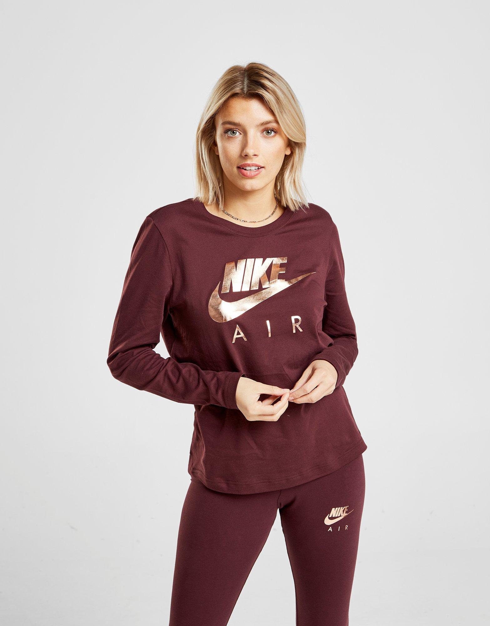 burgundy and gold nike shirt