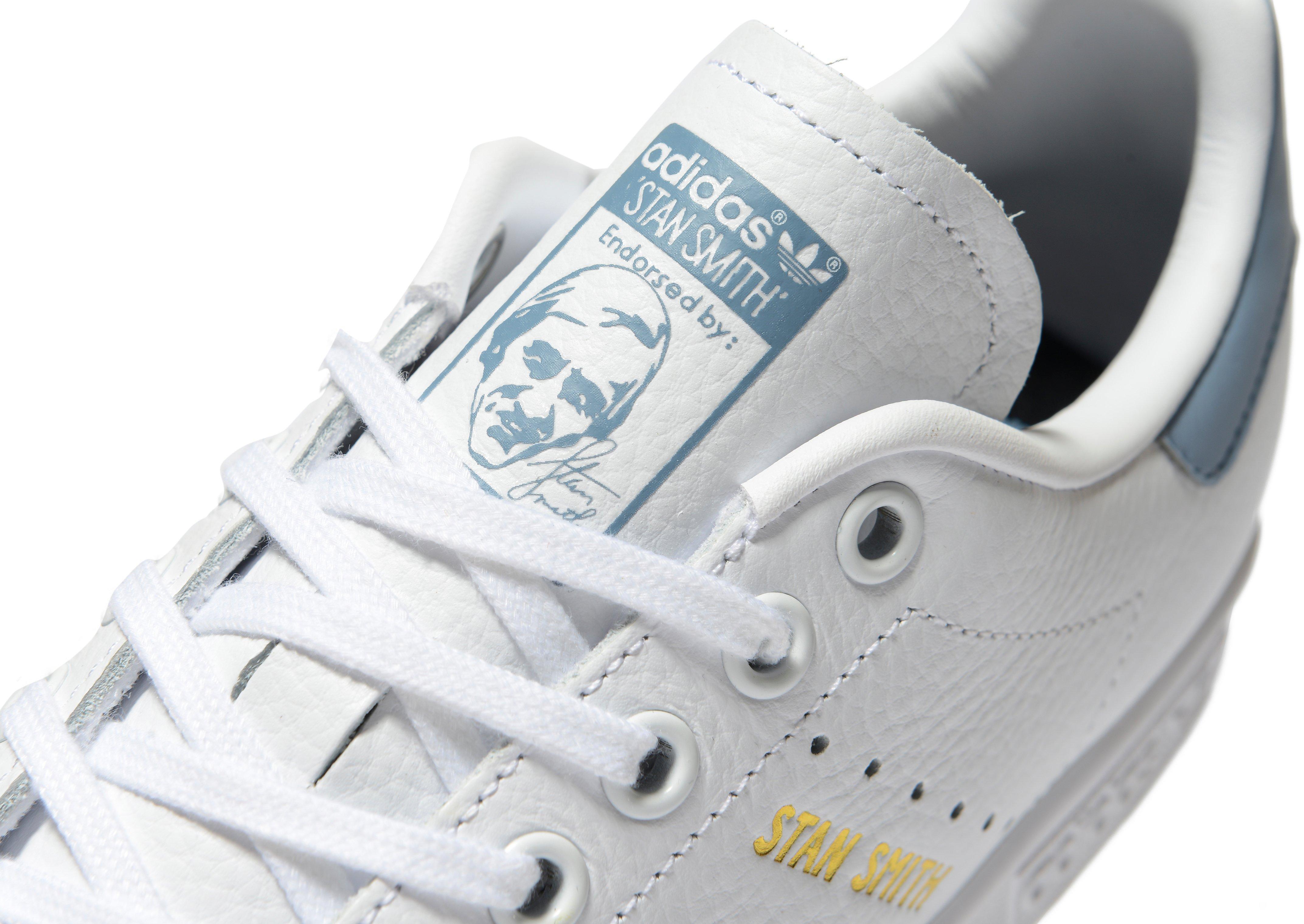 all white stan smith junior