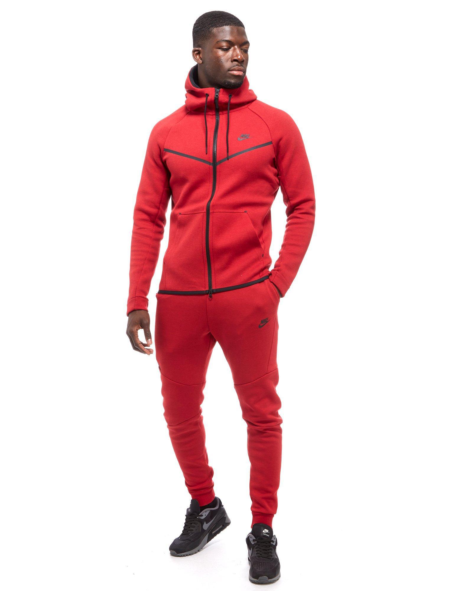 red and black nike tech sweatsuit