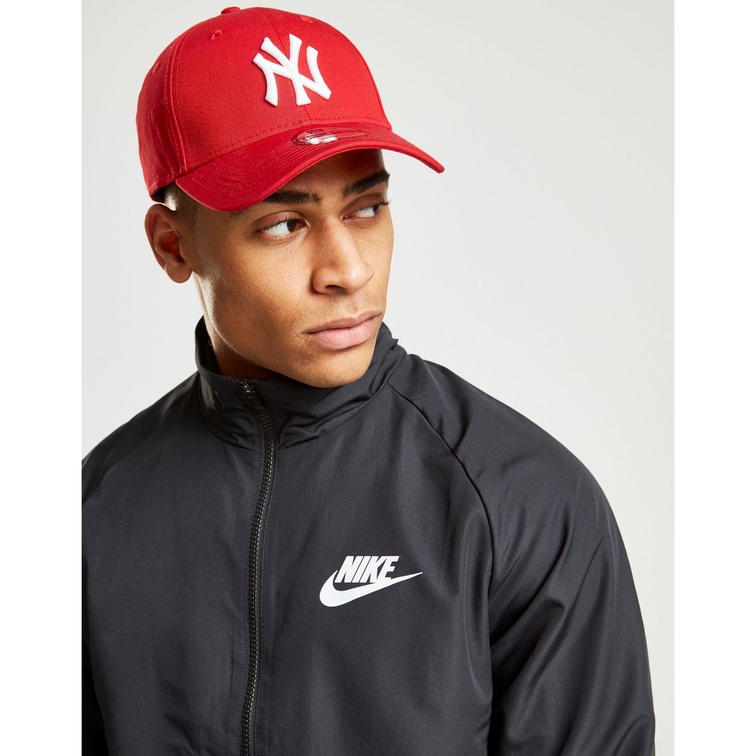 nike season 2 woven tracksuit red