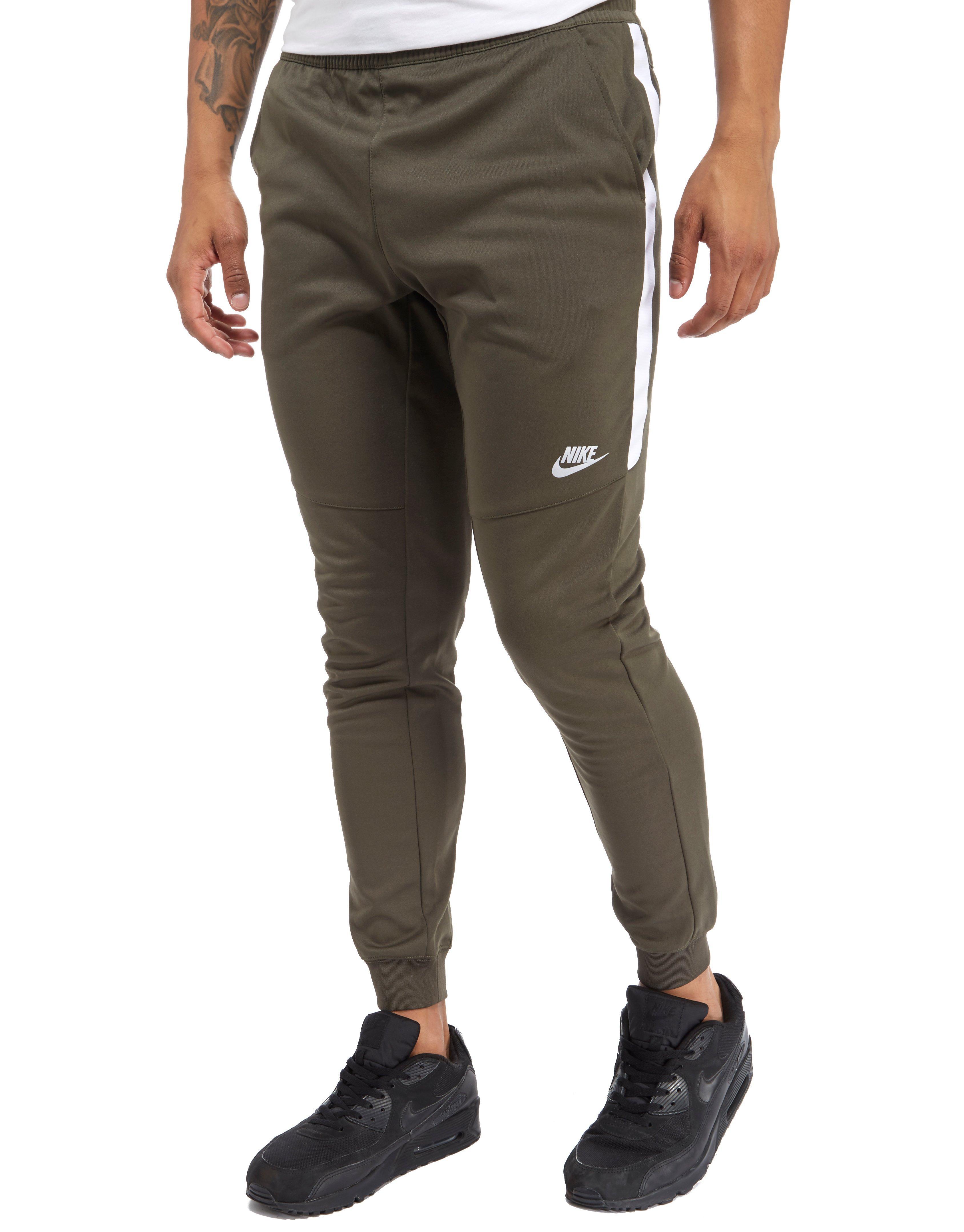 Nike Green Tracksuit Bottoms At Michael Brehm Blog