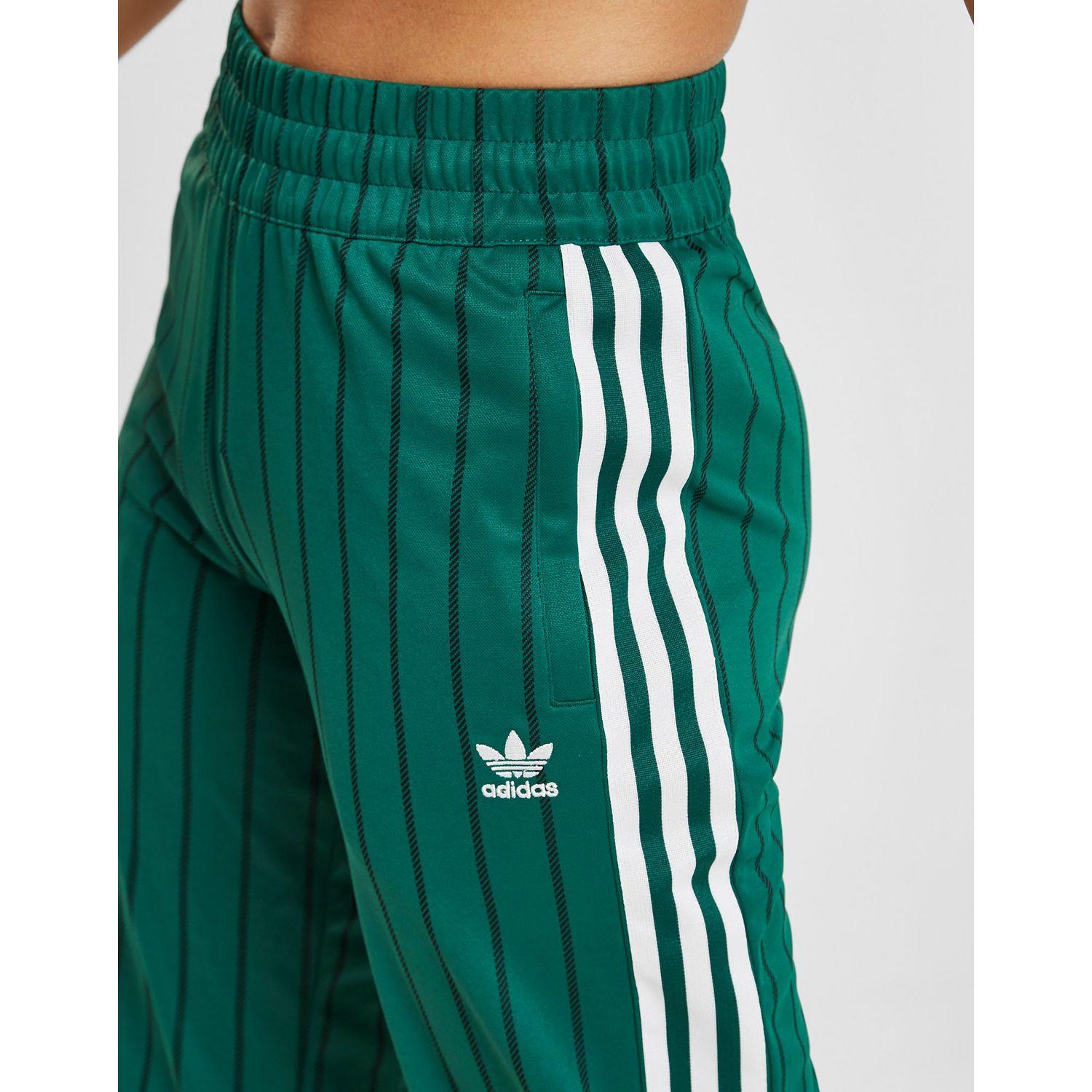 adidas pants with green stripes