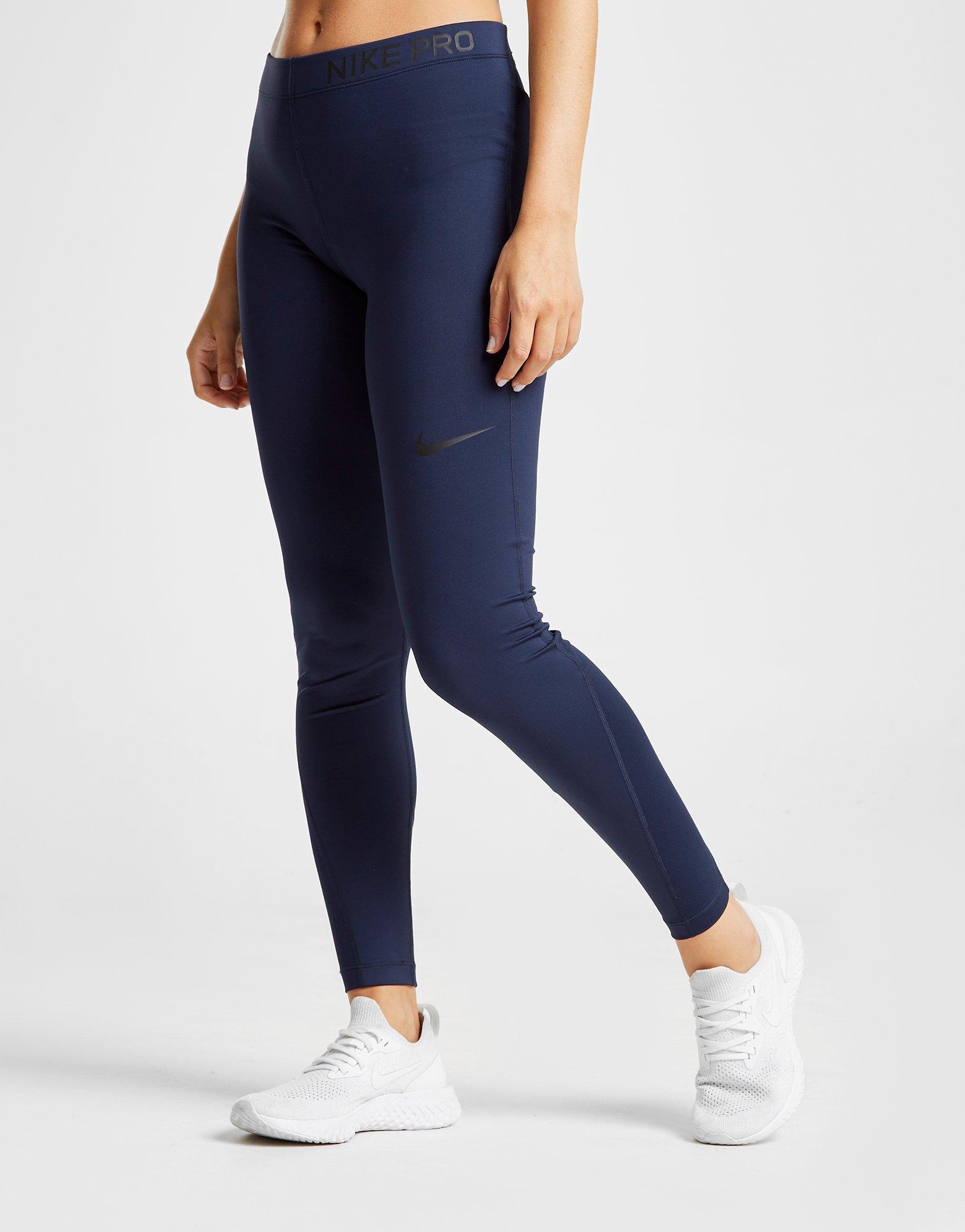 nike pro training leggings in navy with rose gold waistband
