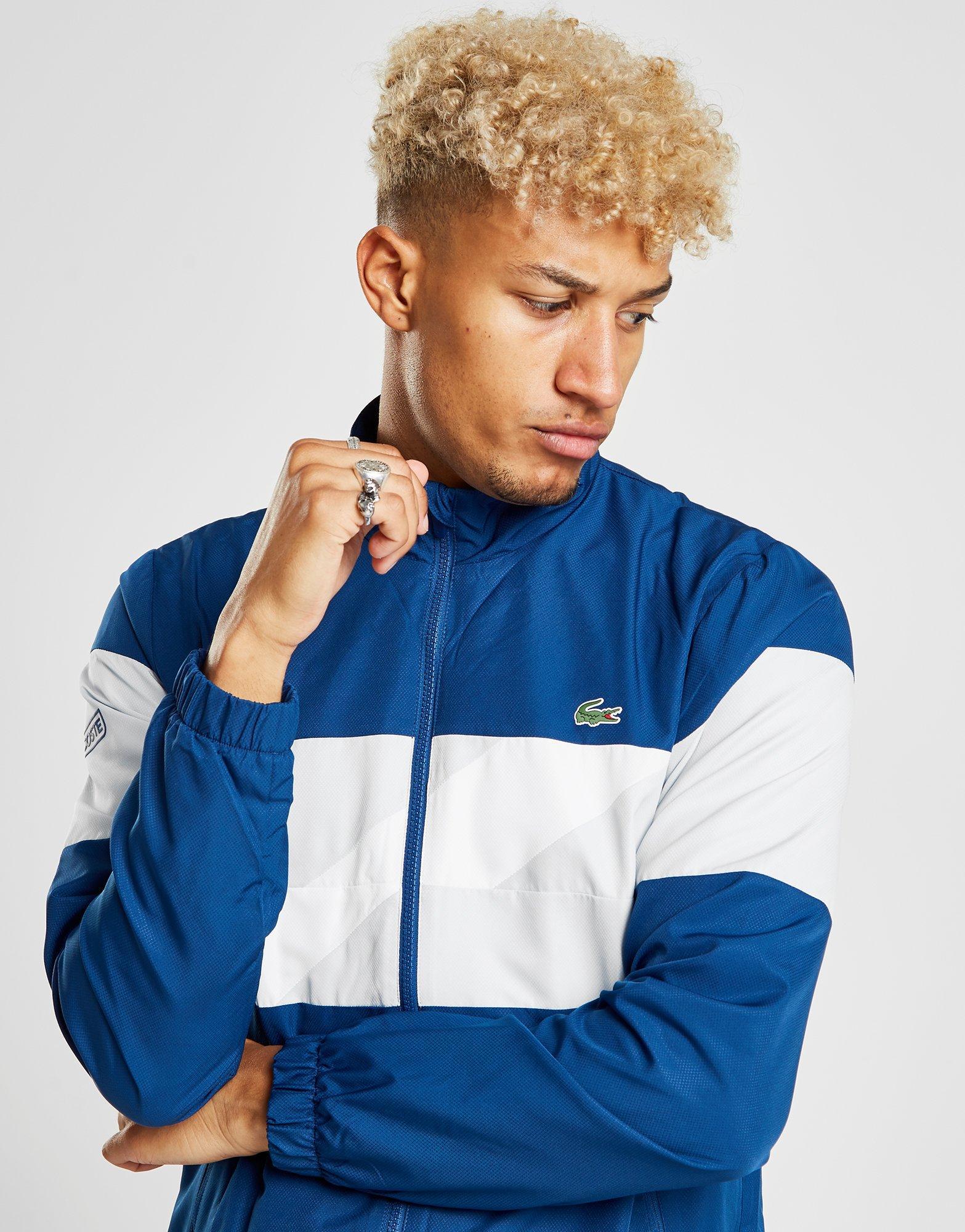Blue and white lacoste tracksuit Clearance