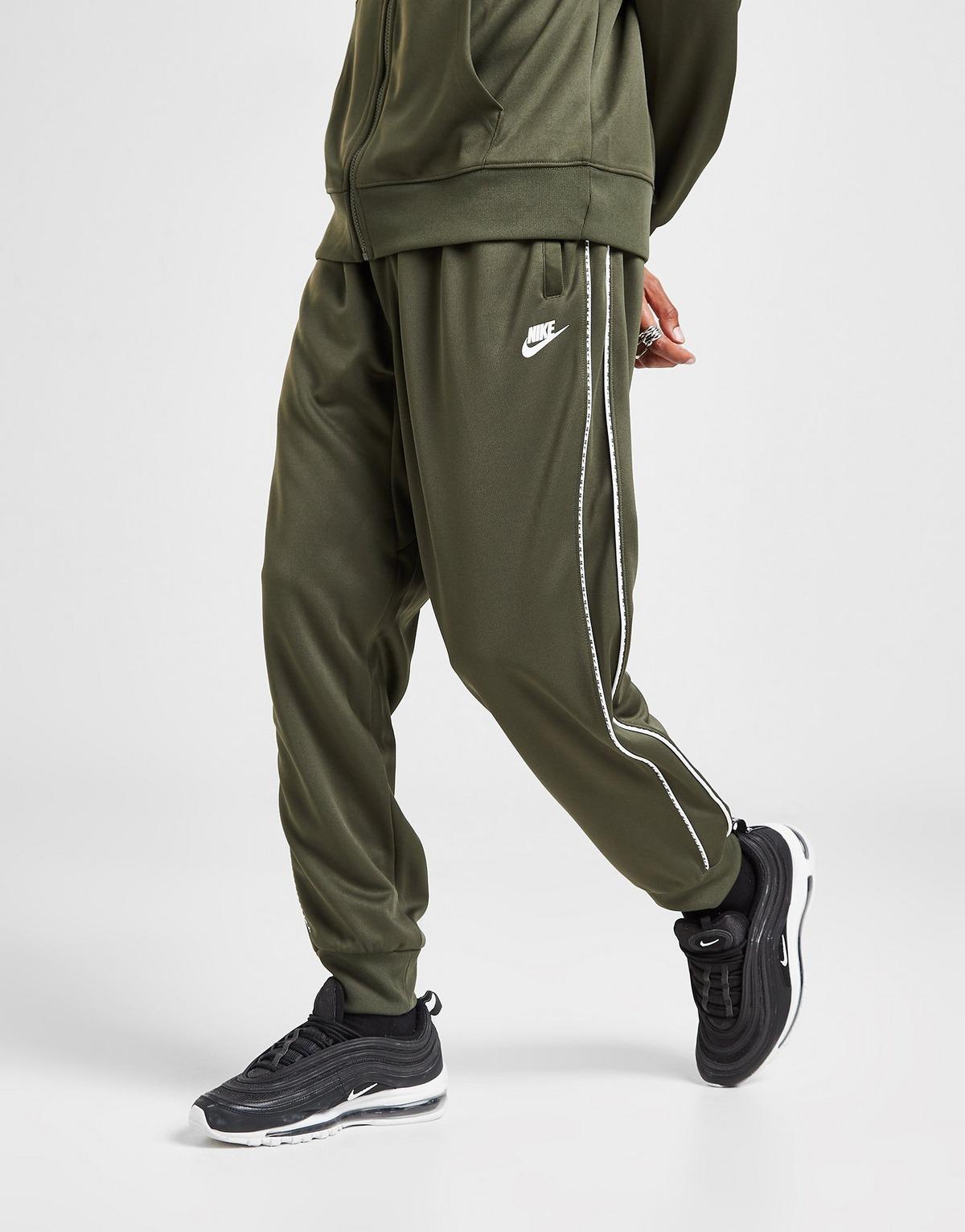 nike track pants green