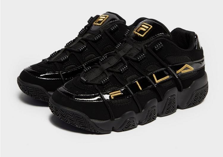gold fila trainers