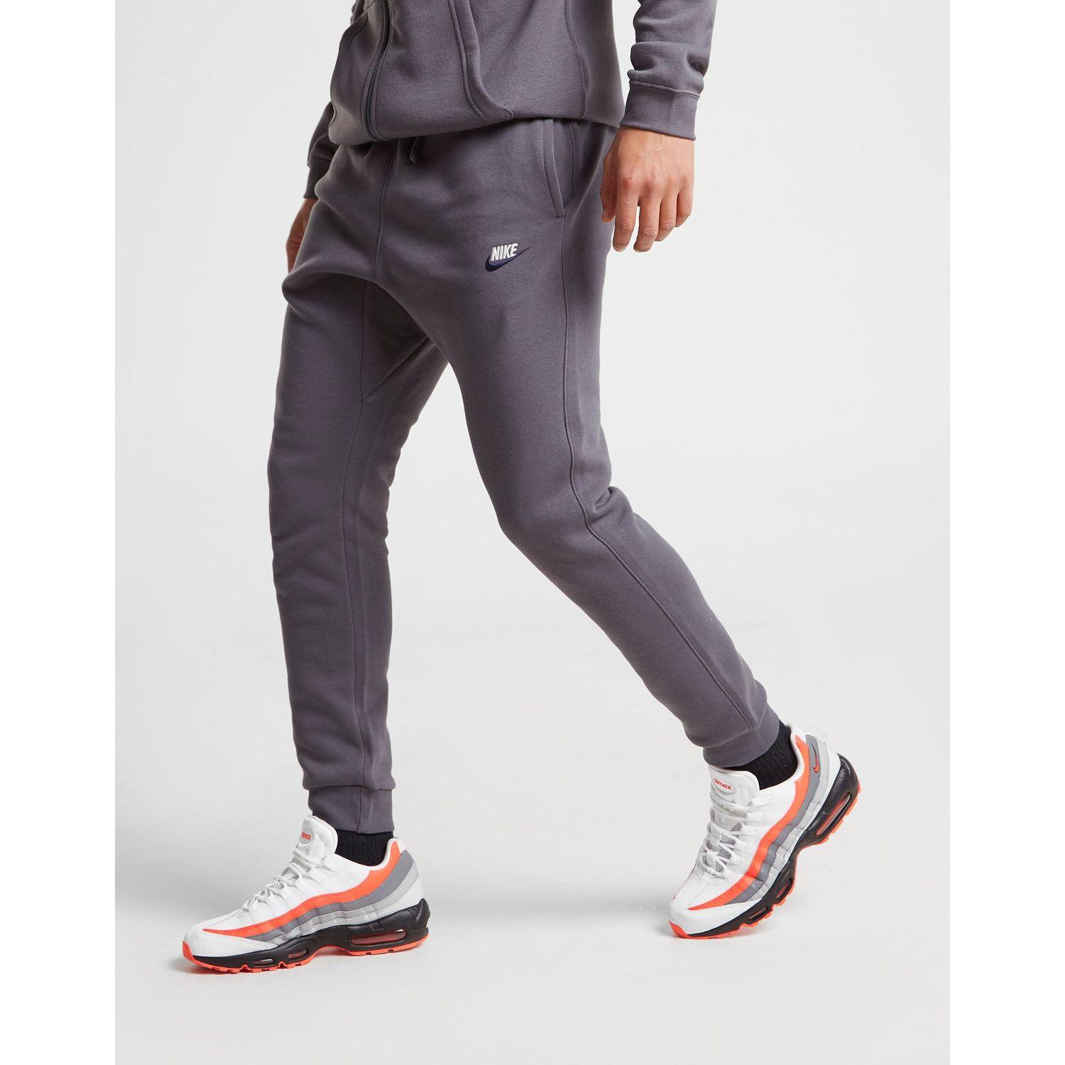 nike grey joggers with red tick