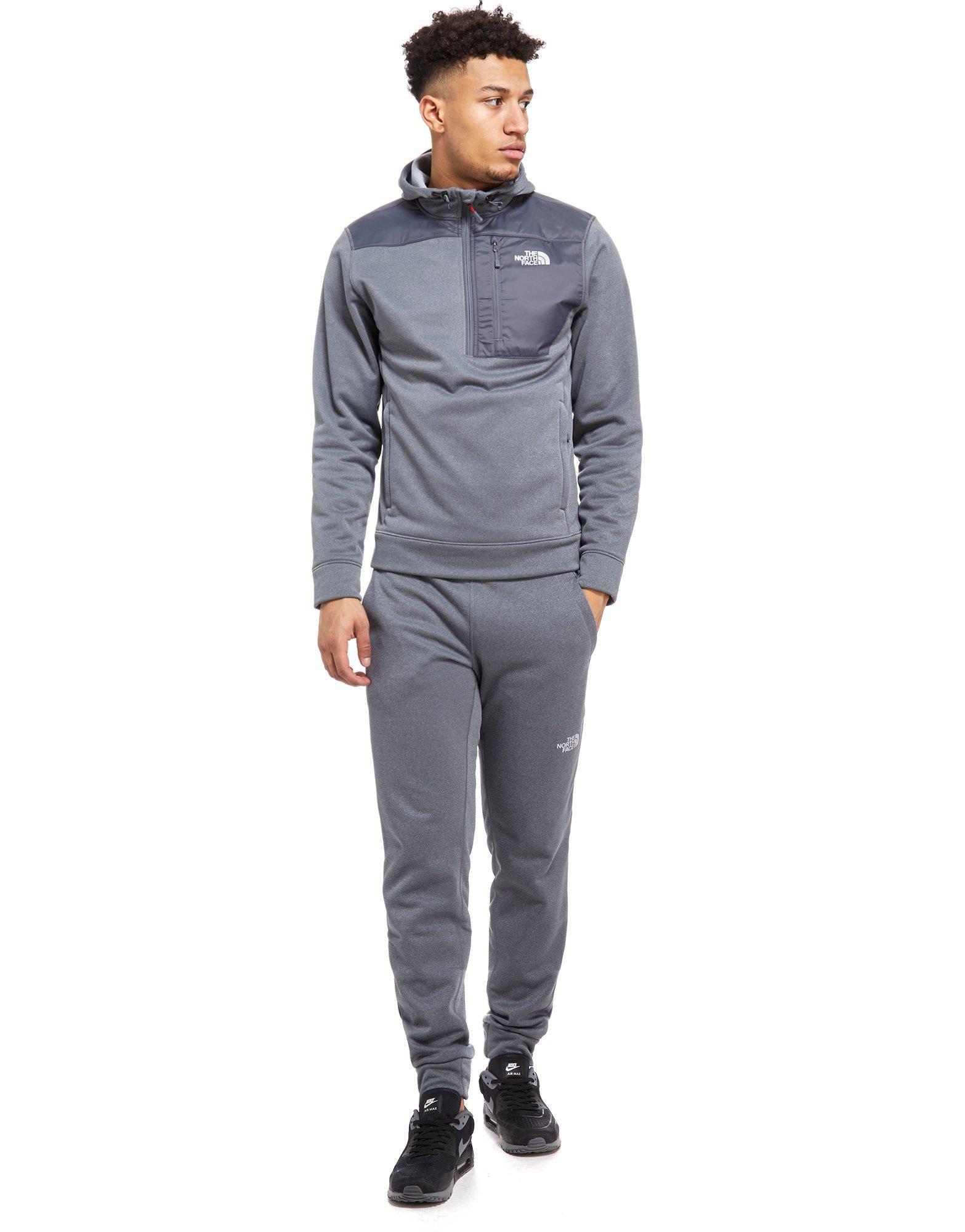 black and grey north face tracksuit
