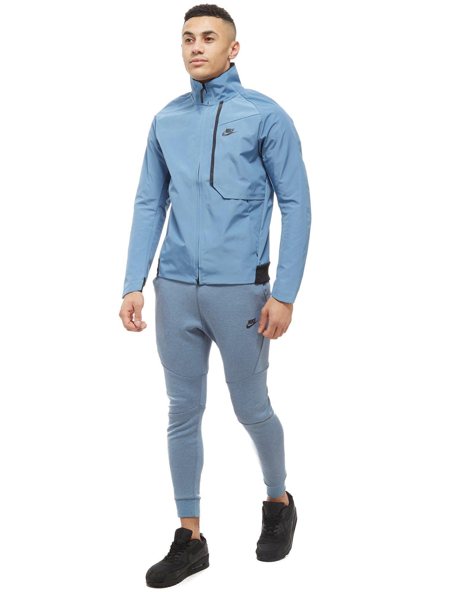 nike tech woven track jacket