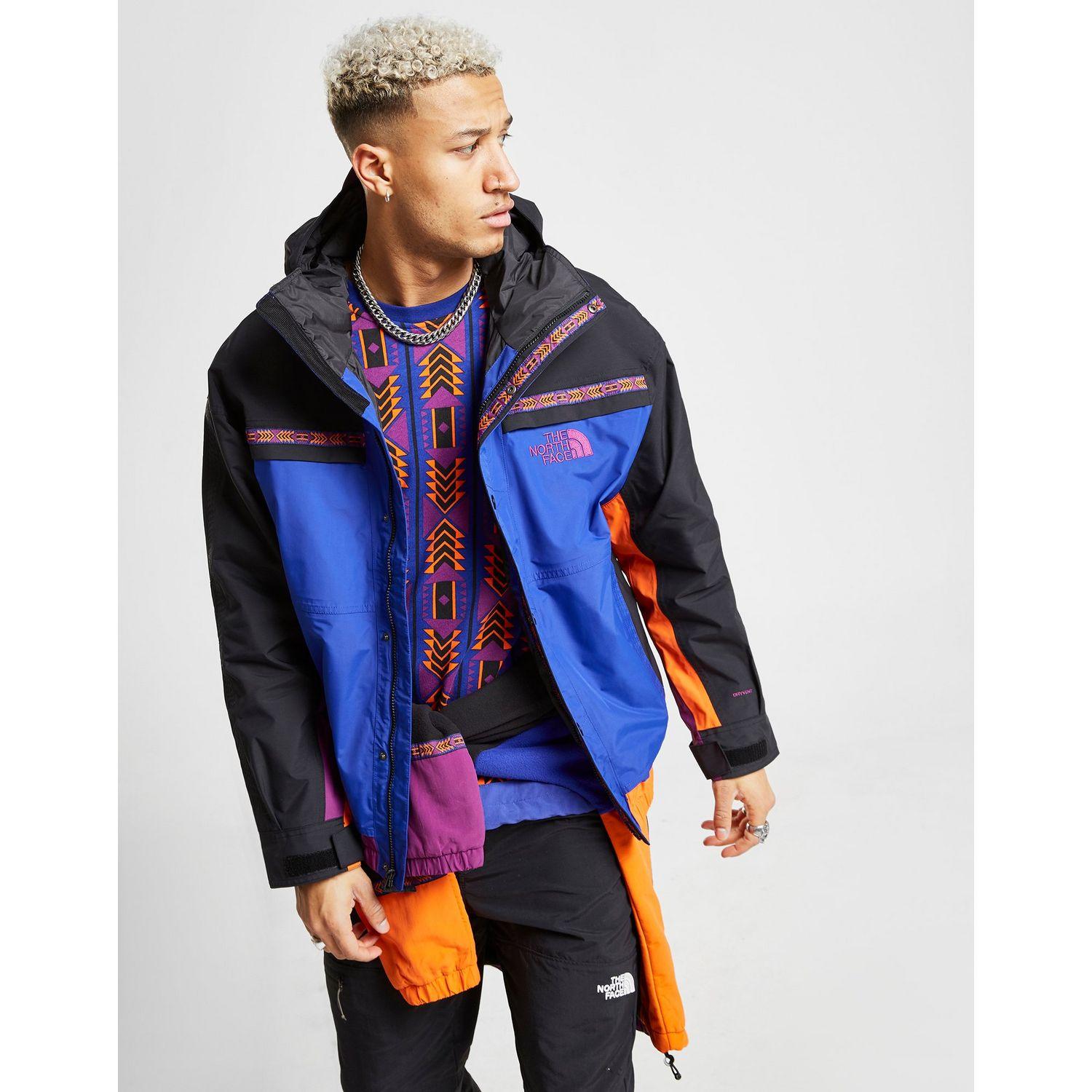 orange and blue north face jacket