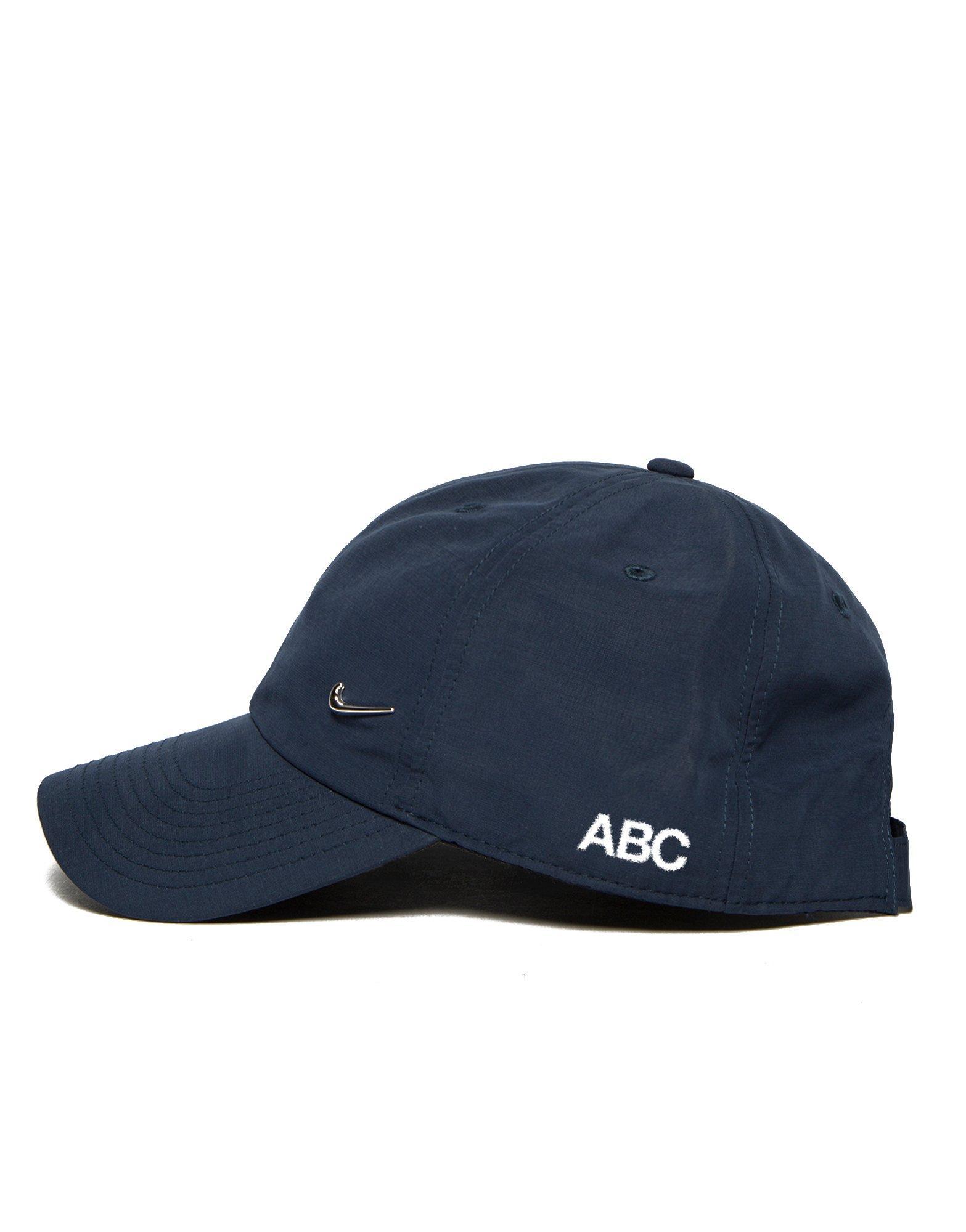 nike side swoosh cap