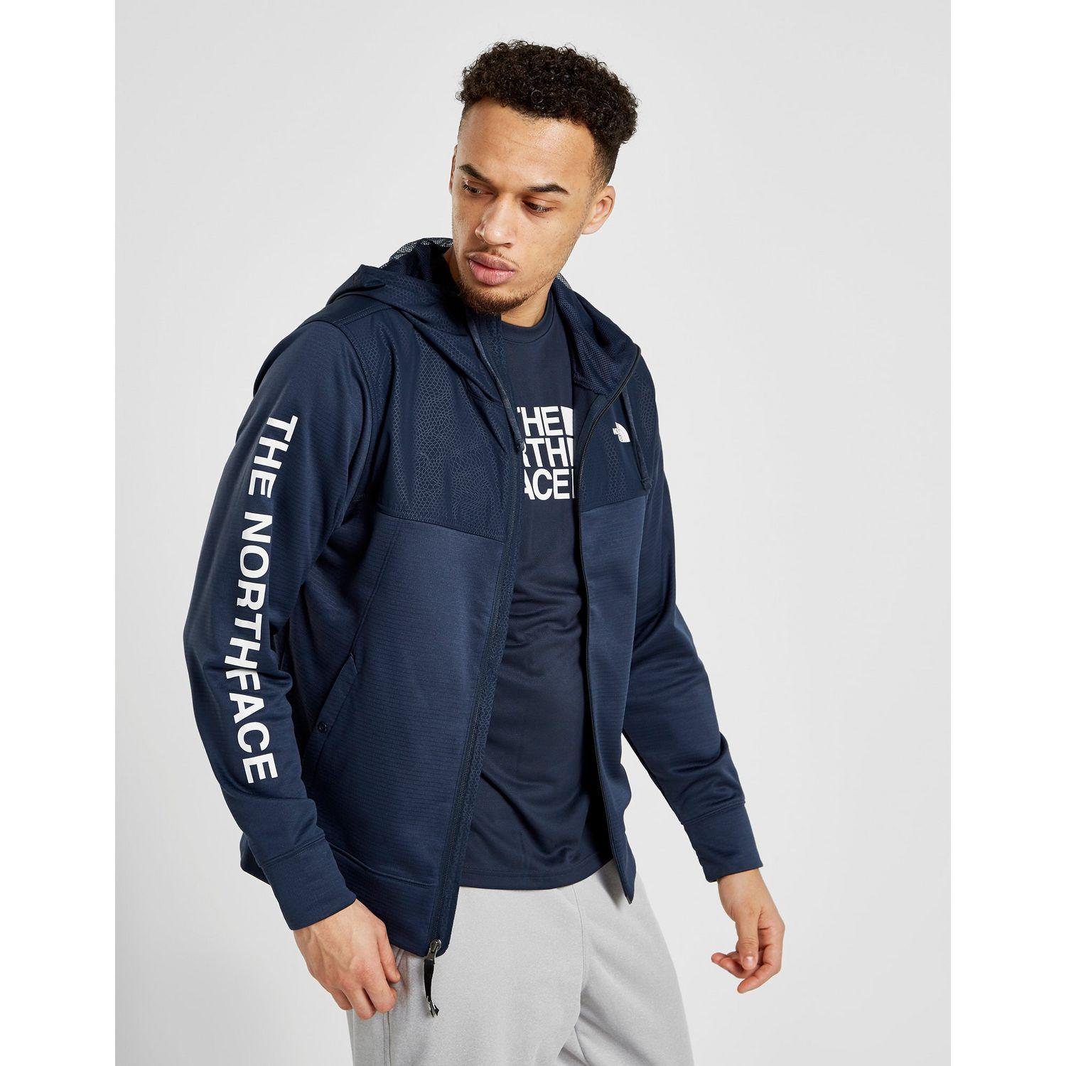 the north face train n logo overlay jacket