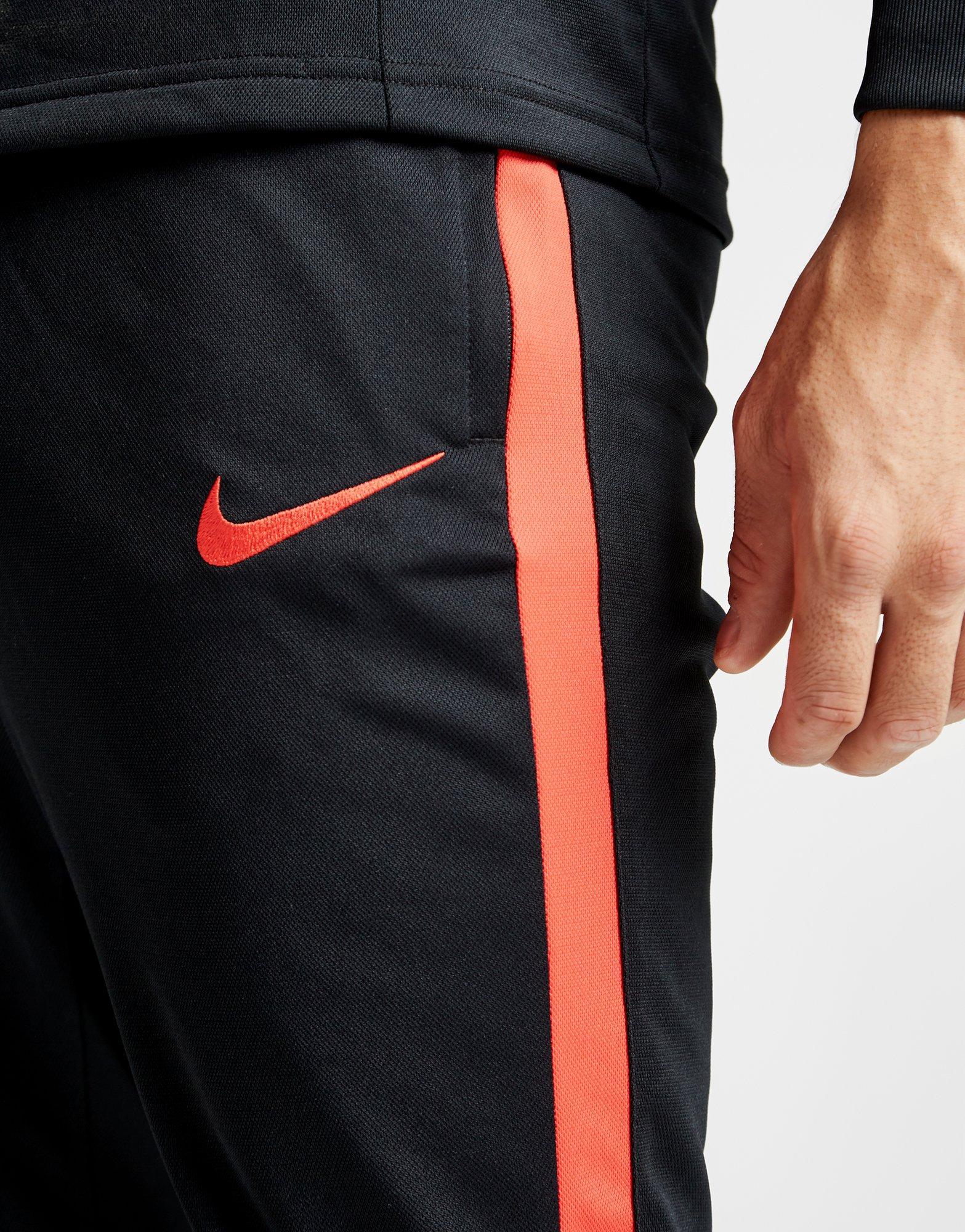 nike academy tracksuit black red