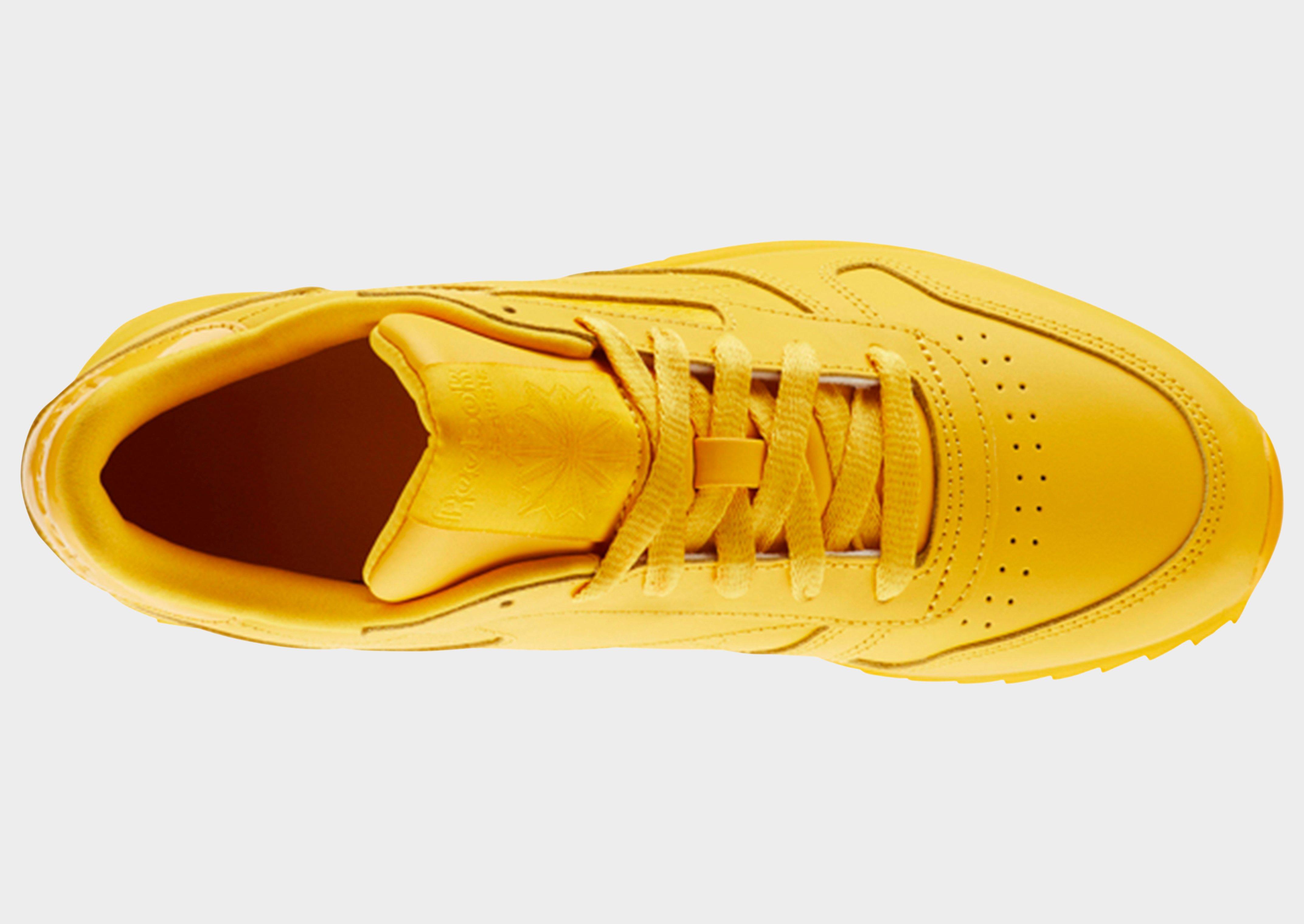 yellow leather reebok