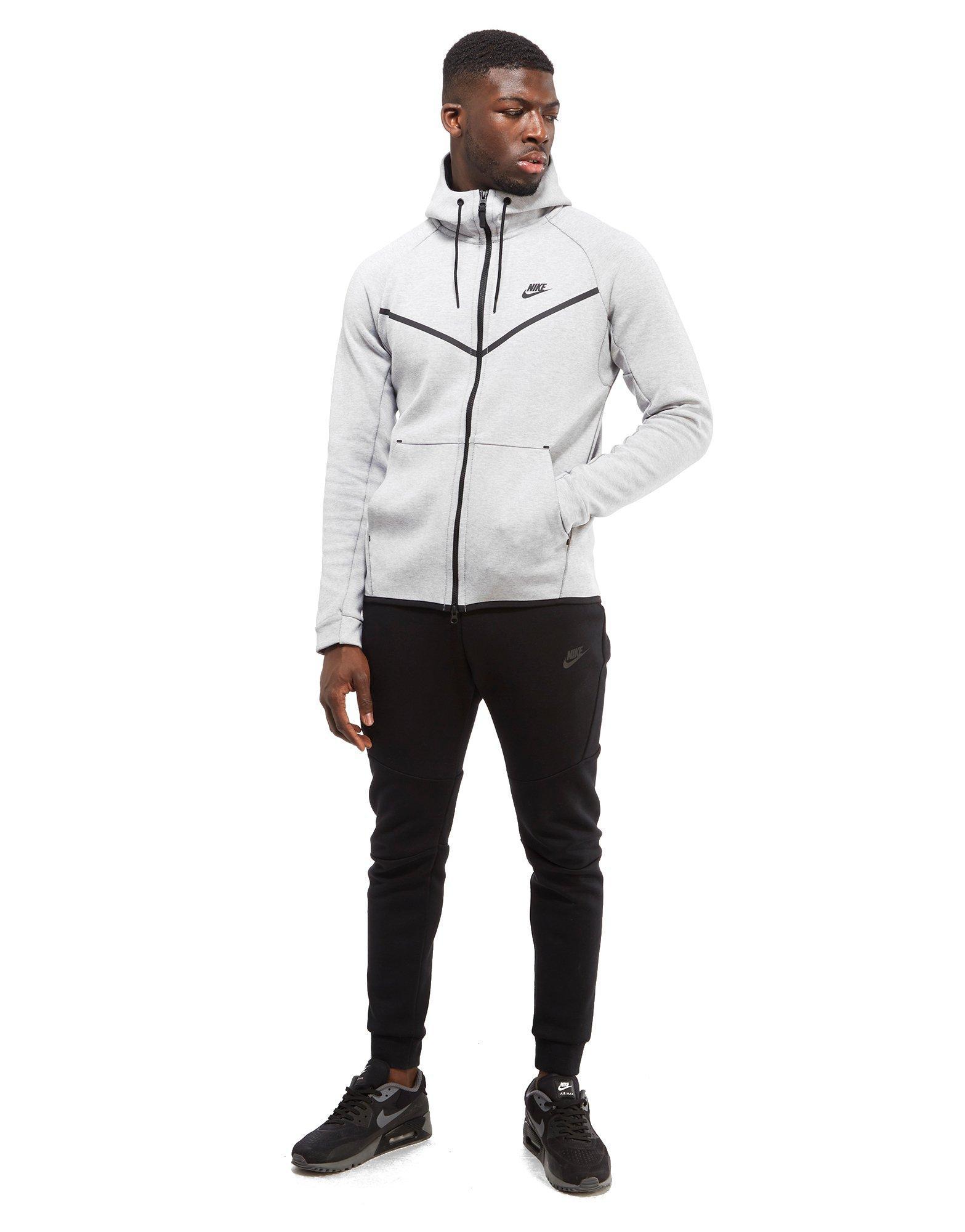 white nike tech jacket