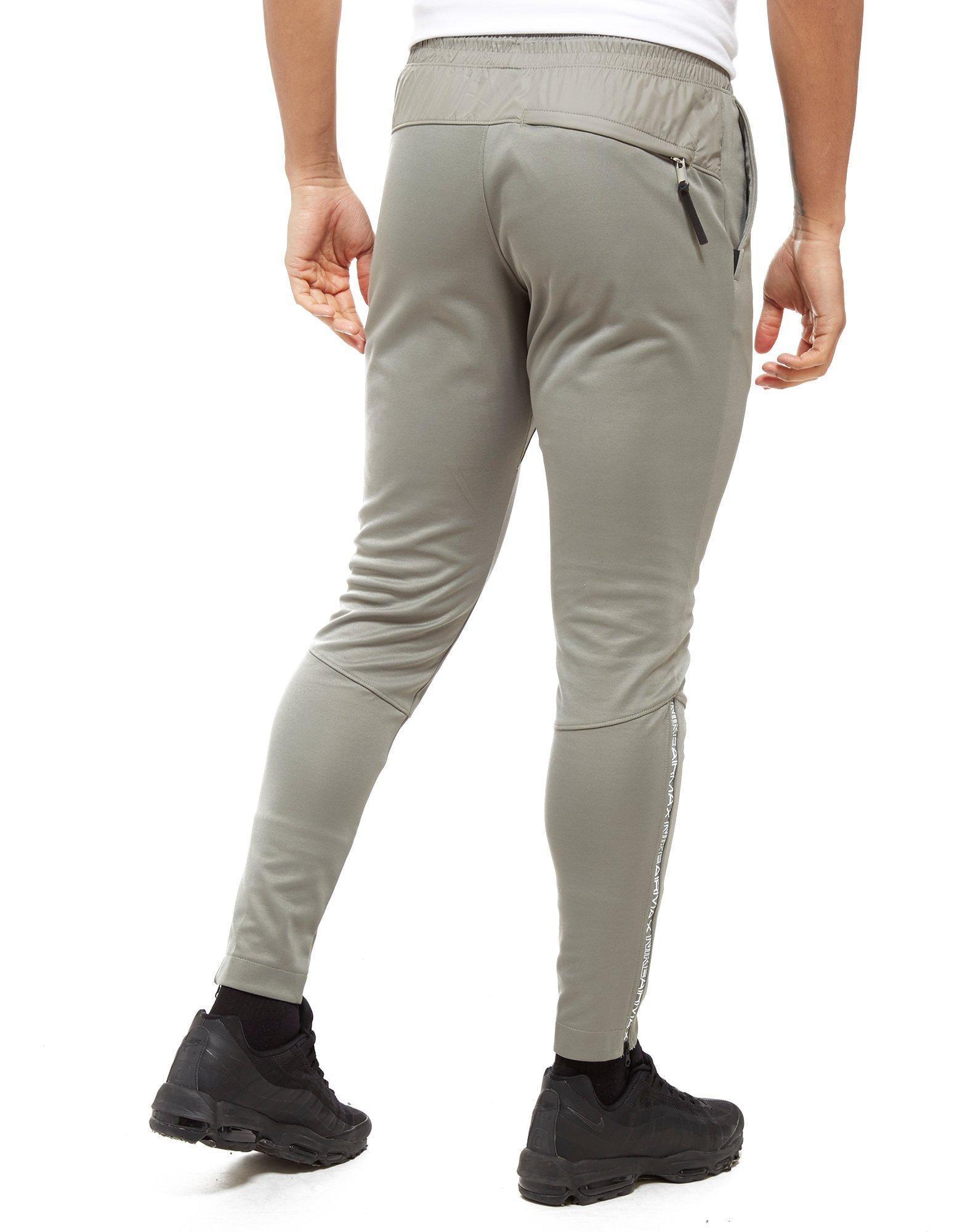 nike grey poly track pants