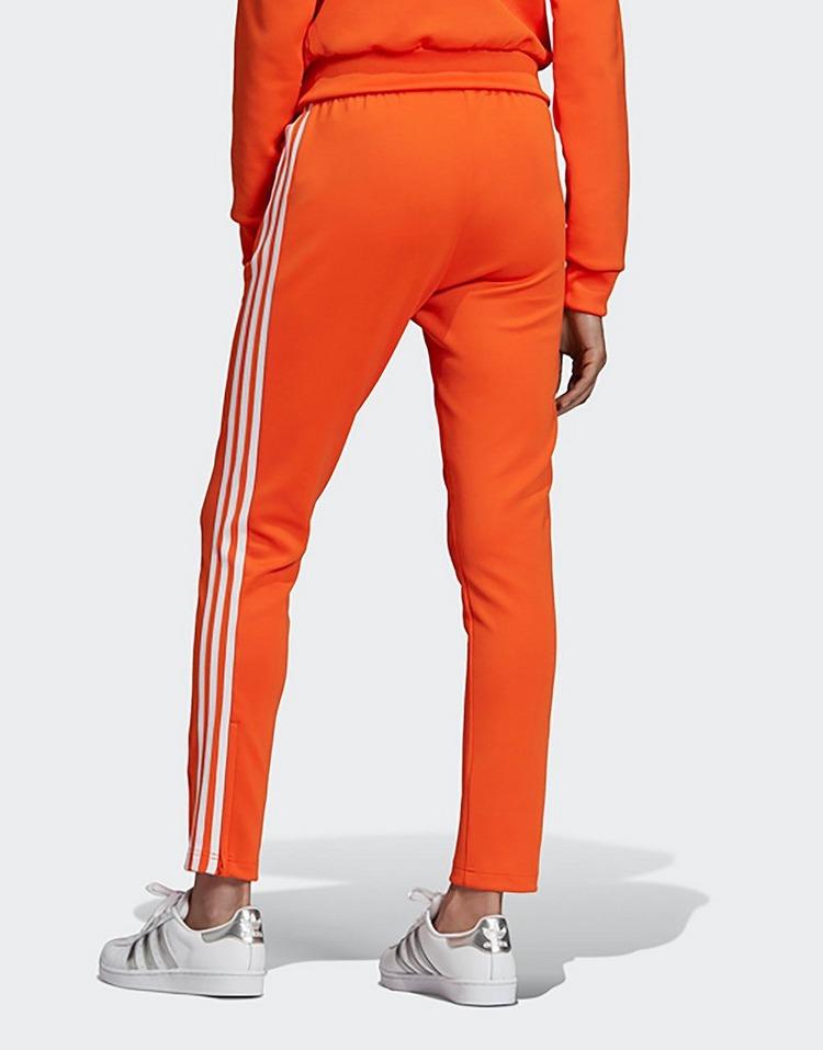 orange adidas jumpsuit