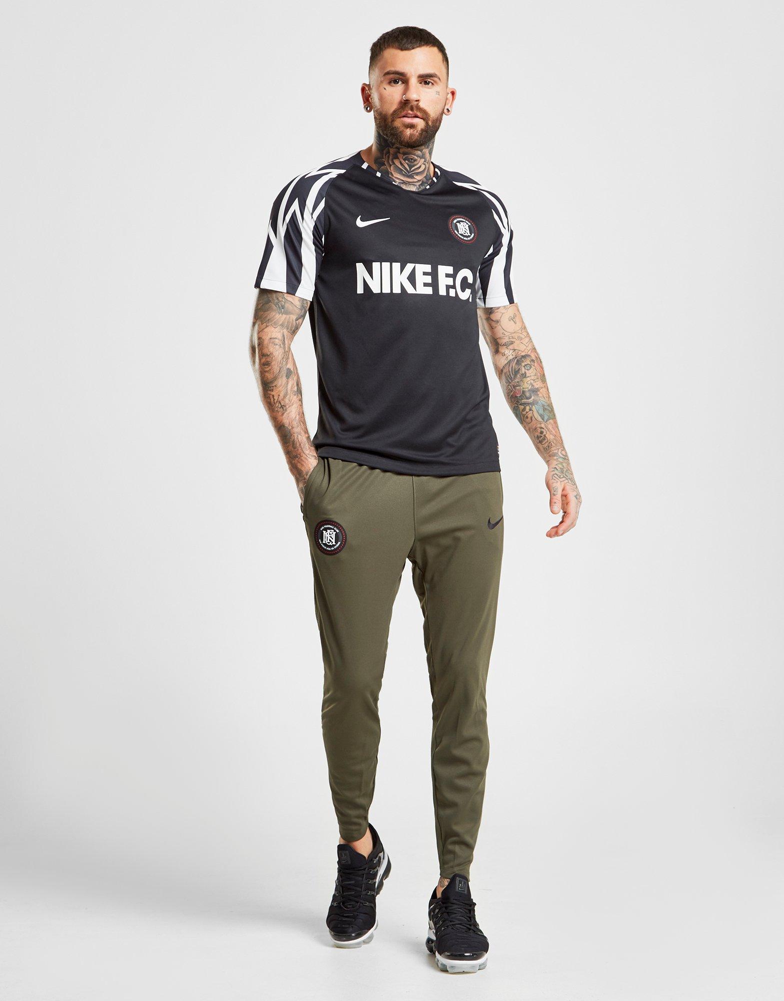 nike fc tape track pants