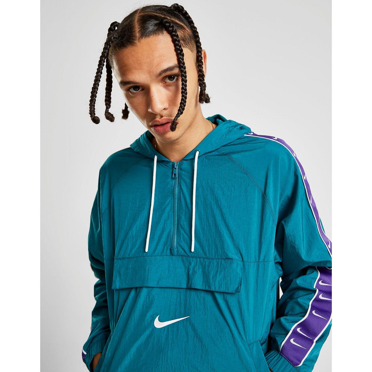 swoosh woven half zip jacket