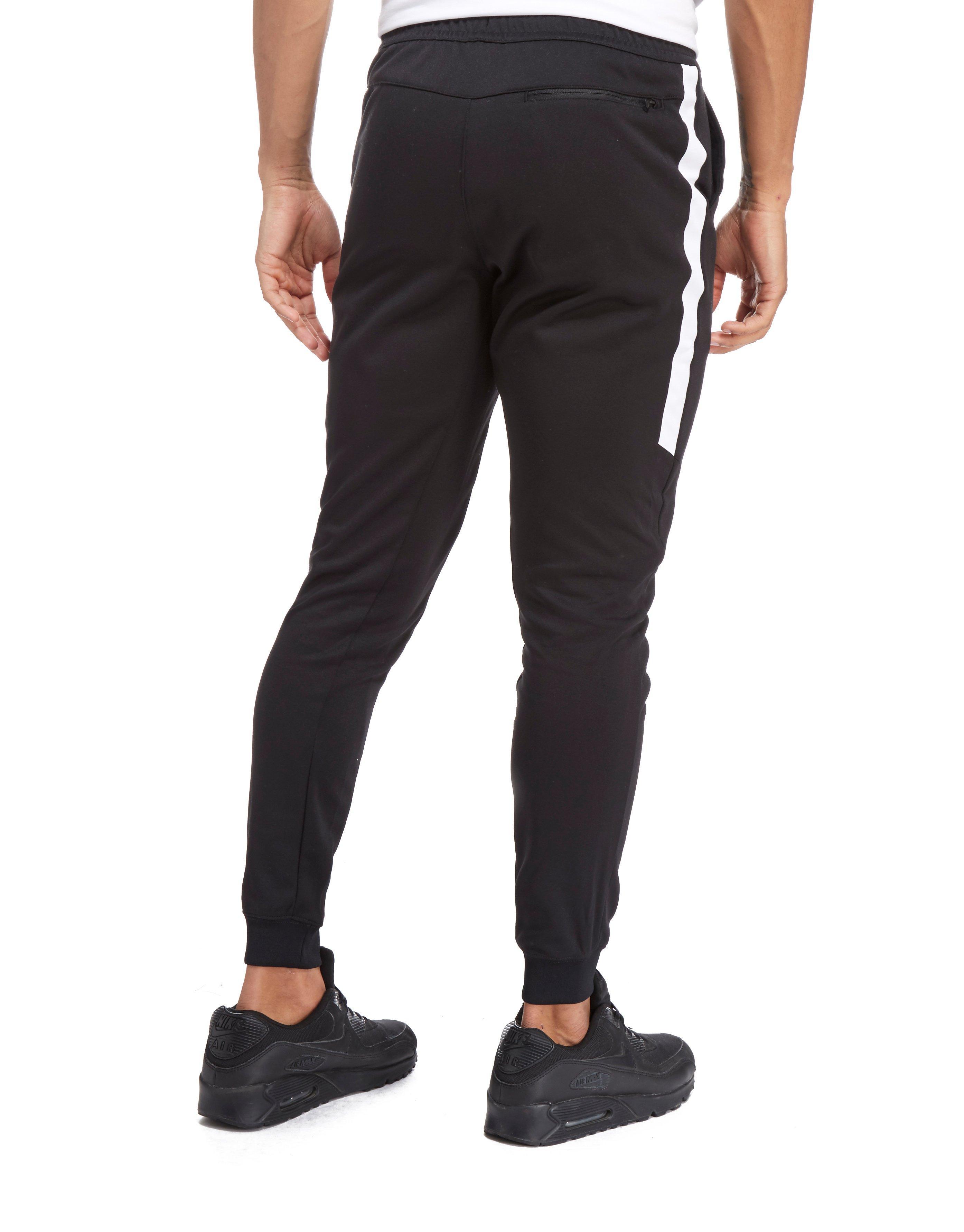 Nike Synthetic Tribute Dc Pants in Black for Men - Lyst