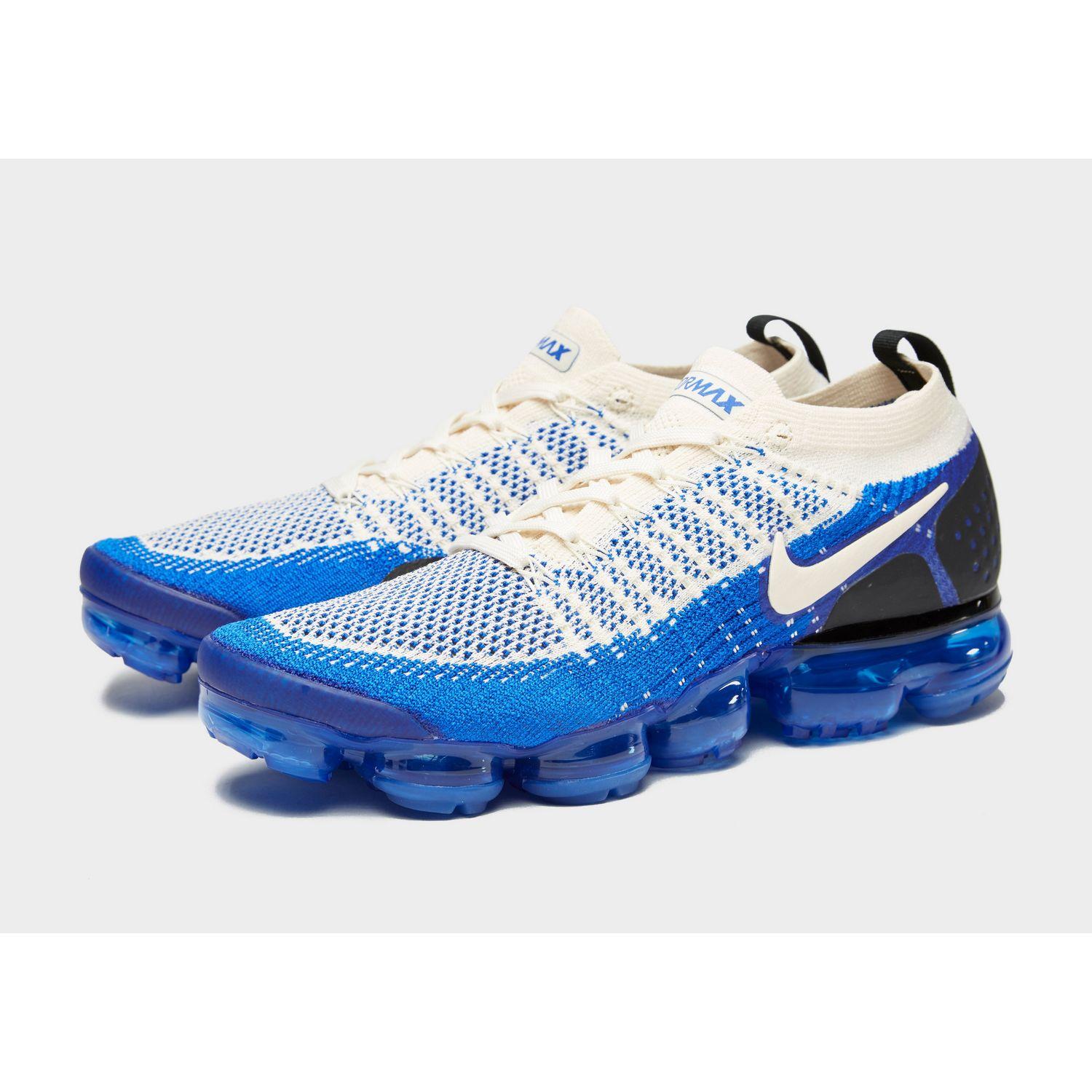 grey and yellow vapormax