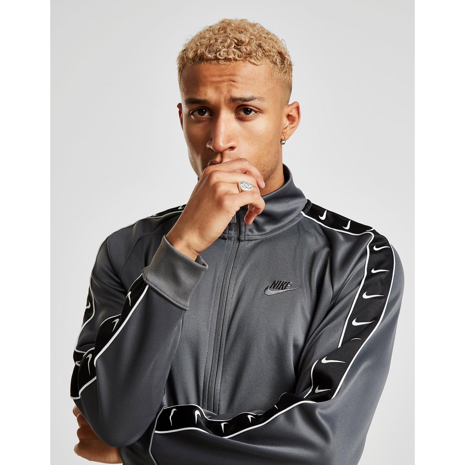 mens nike tape track pants