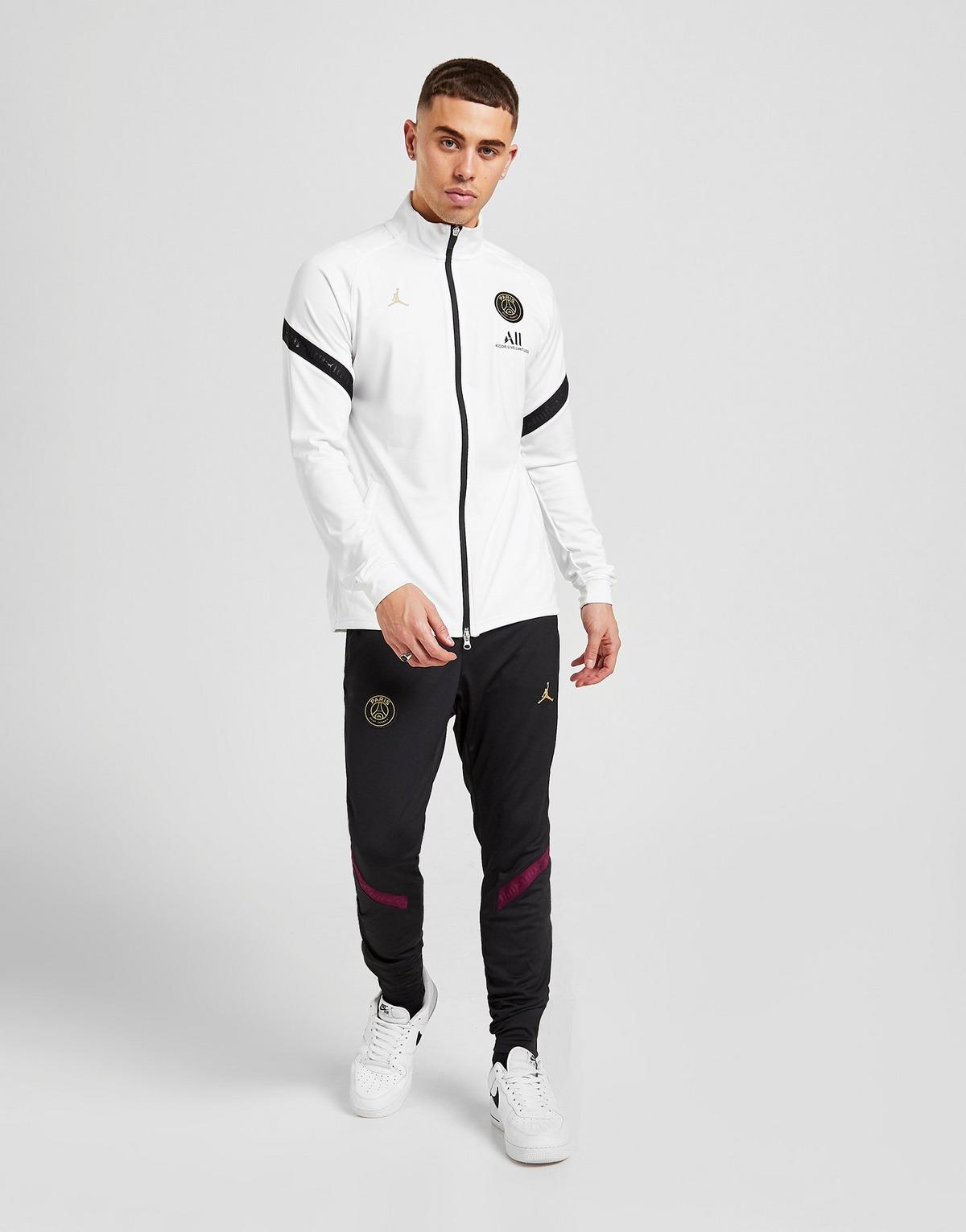 nike tracksuit white and grey