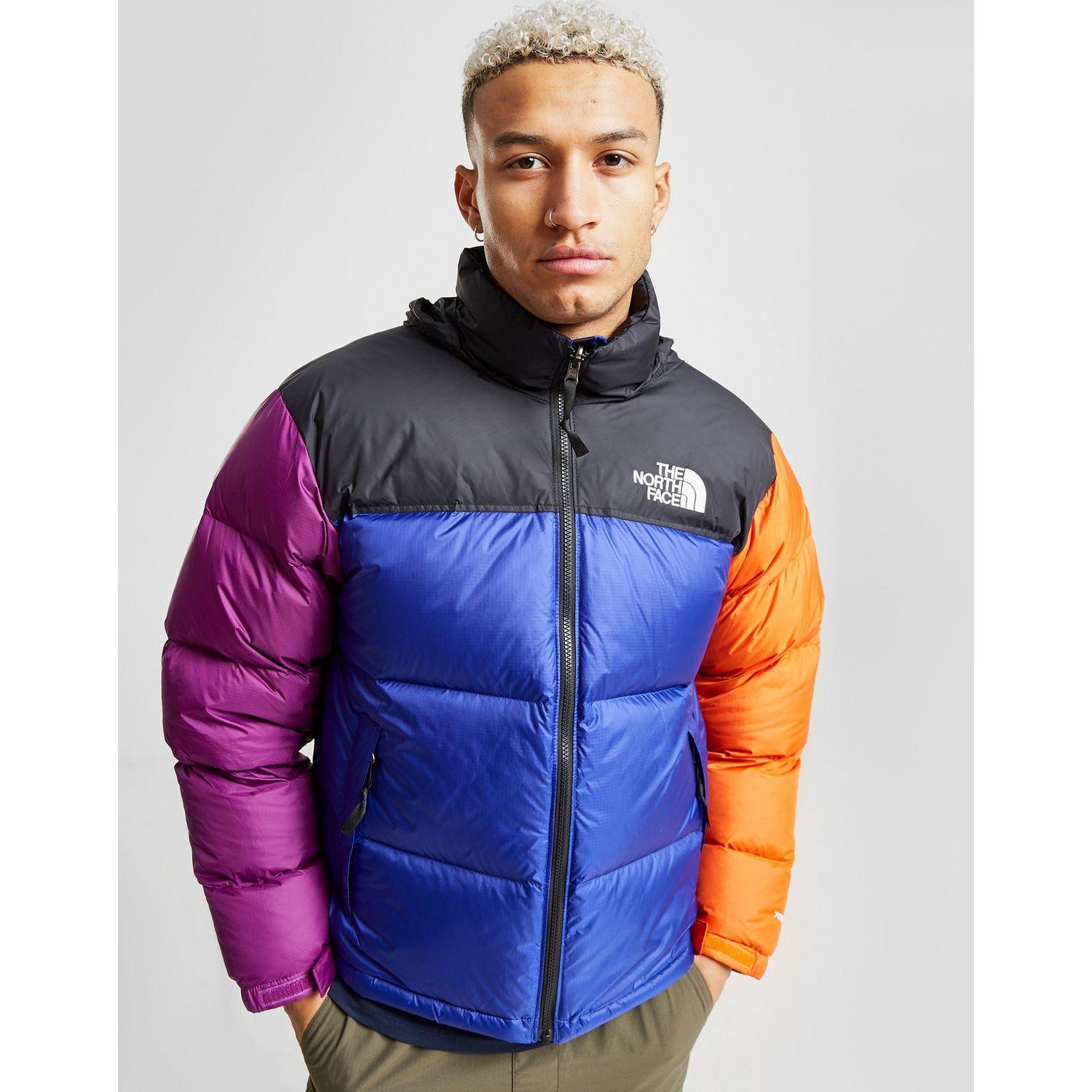 purple and orange north face jacket