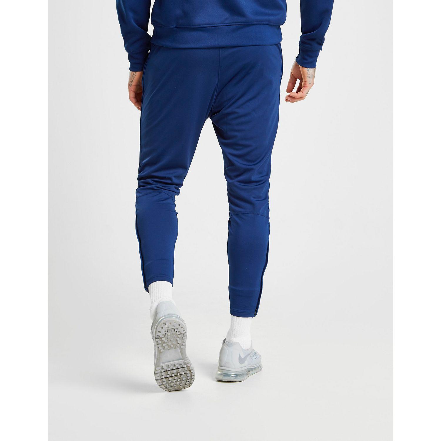 nike fc poly track pants