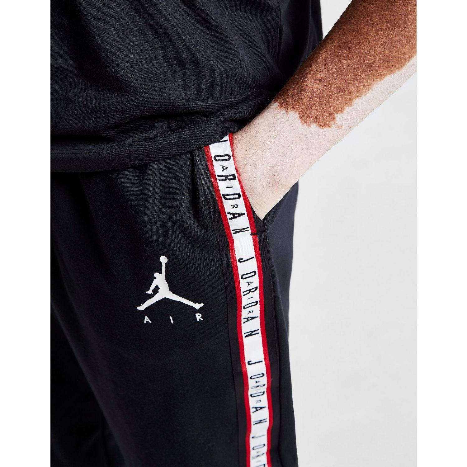 Nike Fleece Tape Track Pants in Black 
