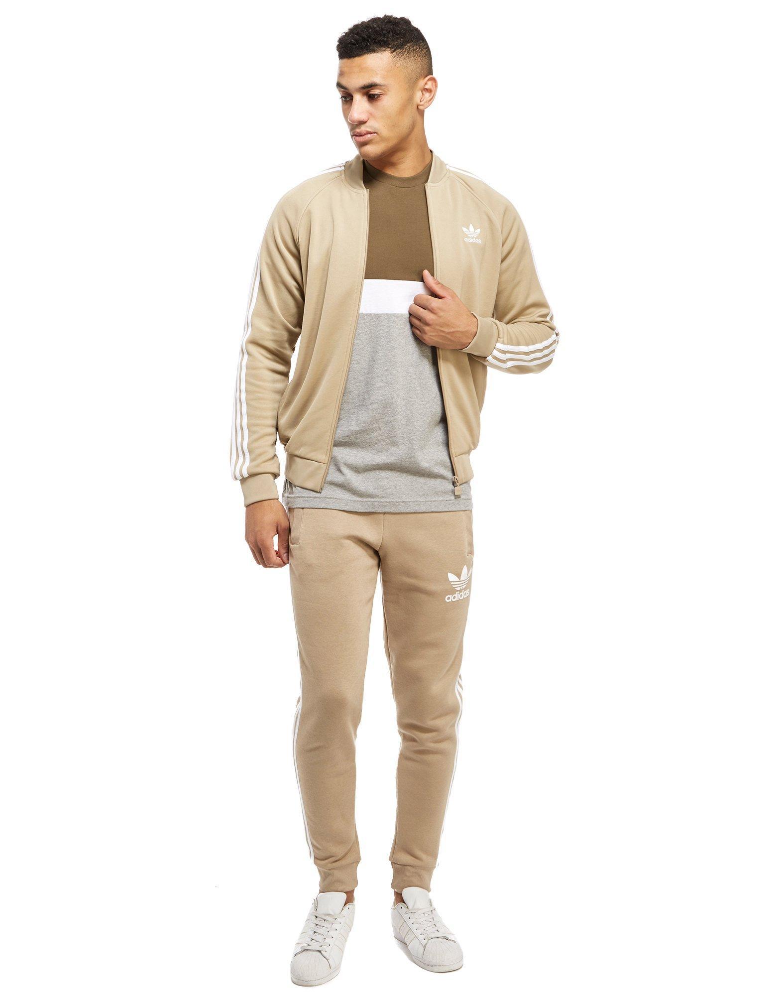 adidas Originals Fleece California Cuffed Track Pants in Stone/White  (Natural) for Men - Lyst