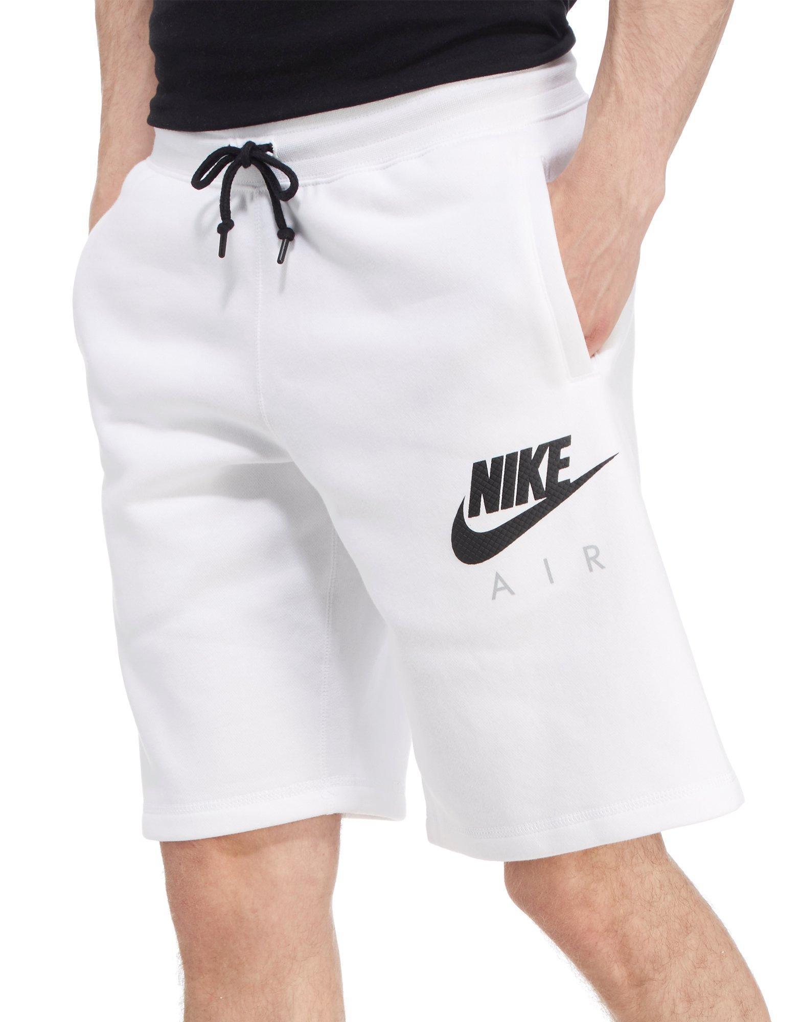 white nike fleece shorts