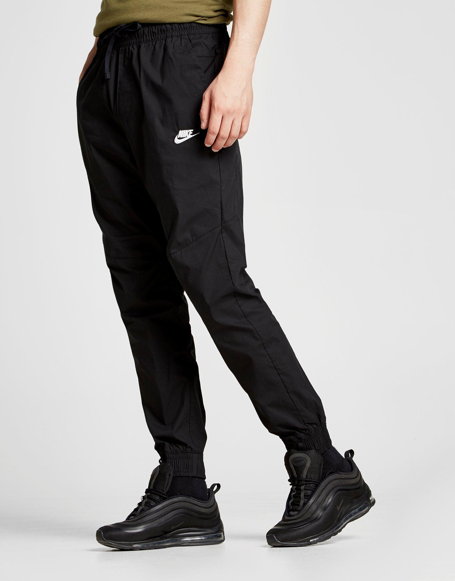 black cuffed track pants