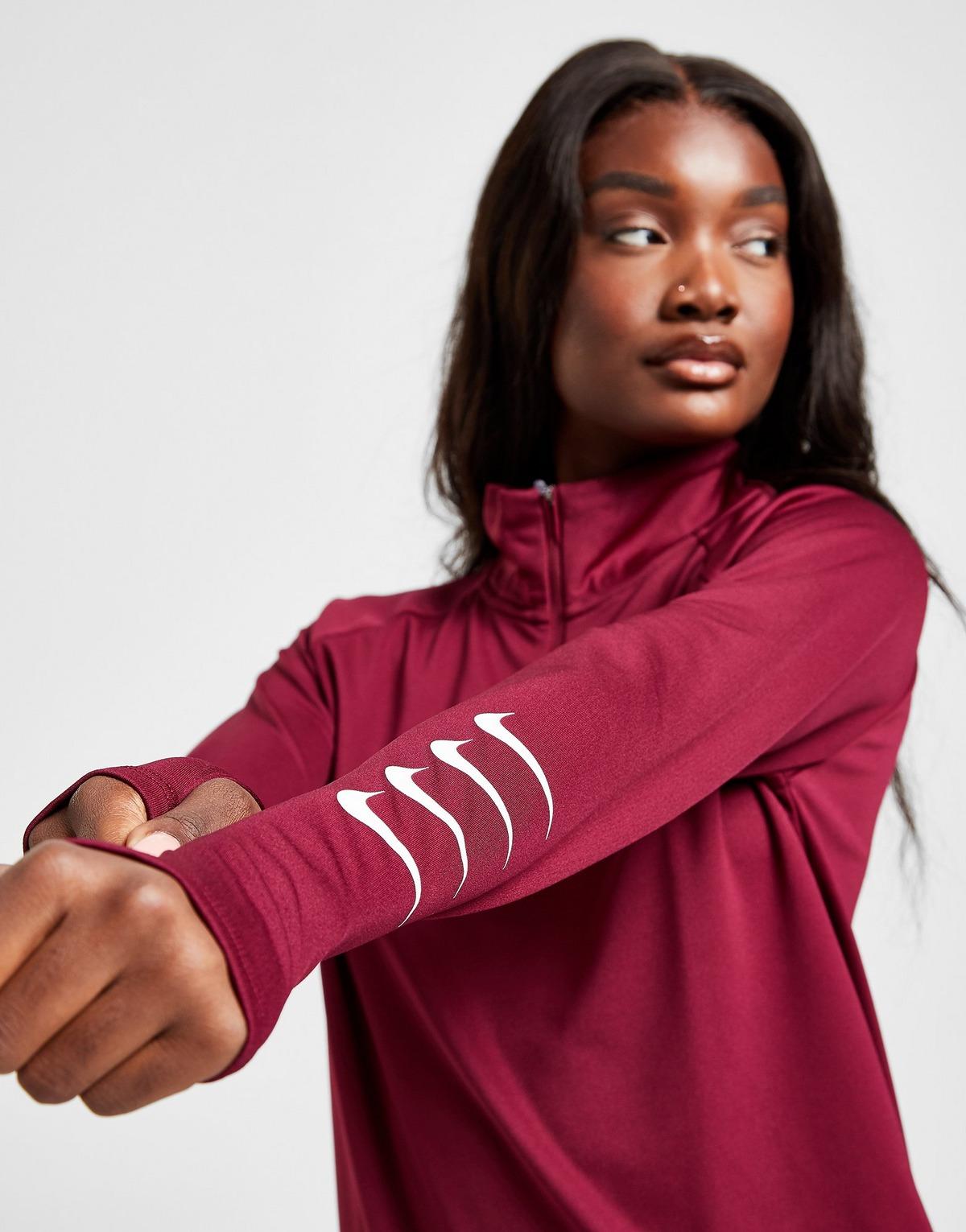 nike swoosh repeat poly track