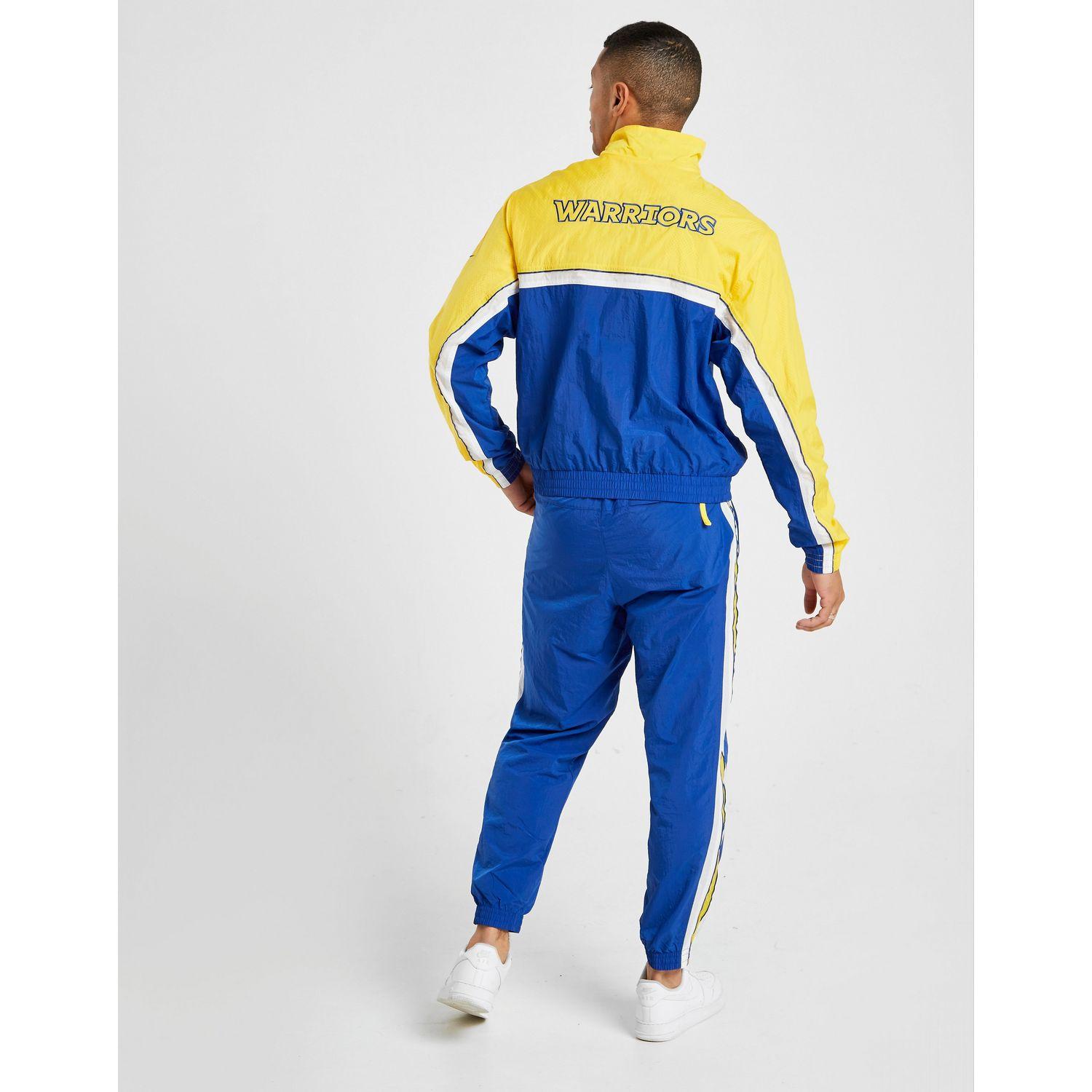 nike gold tracksuit