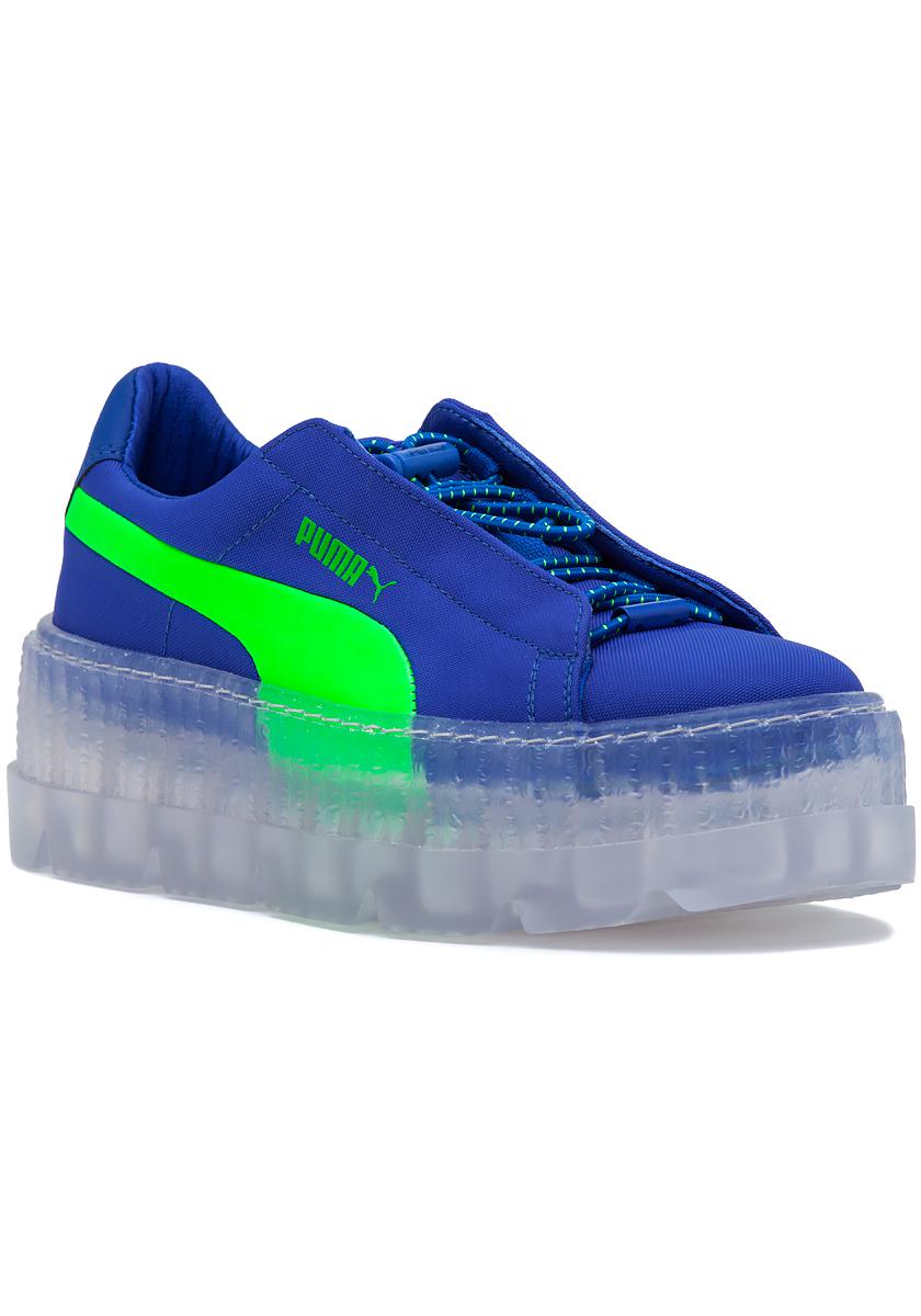 blue and green puma shoes