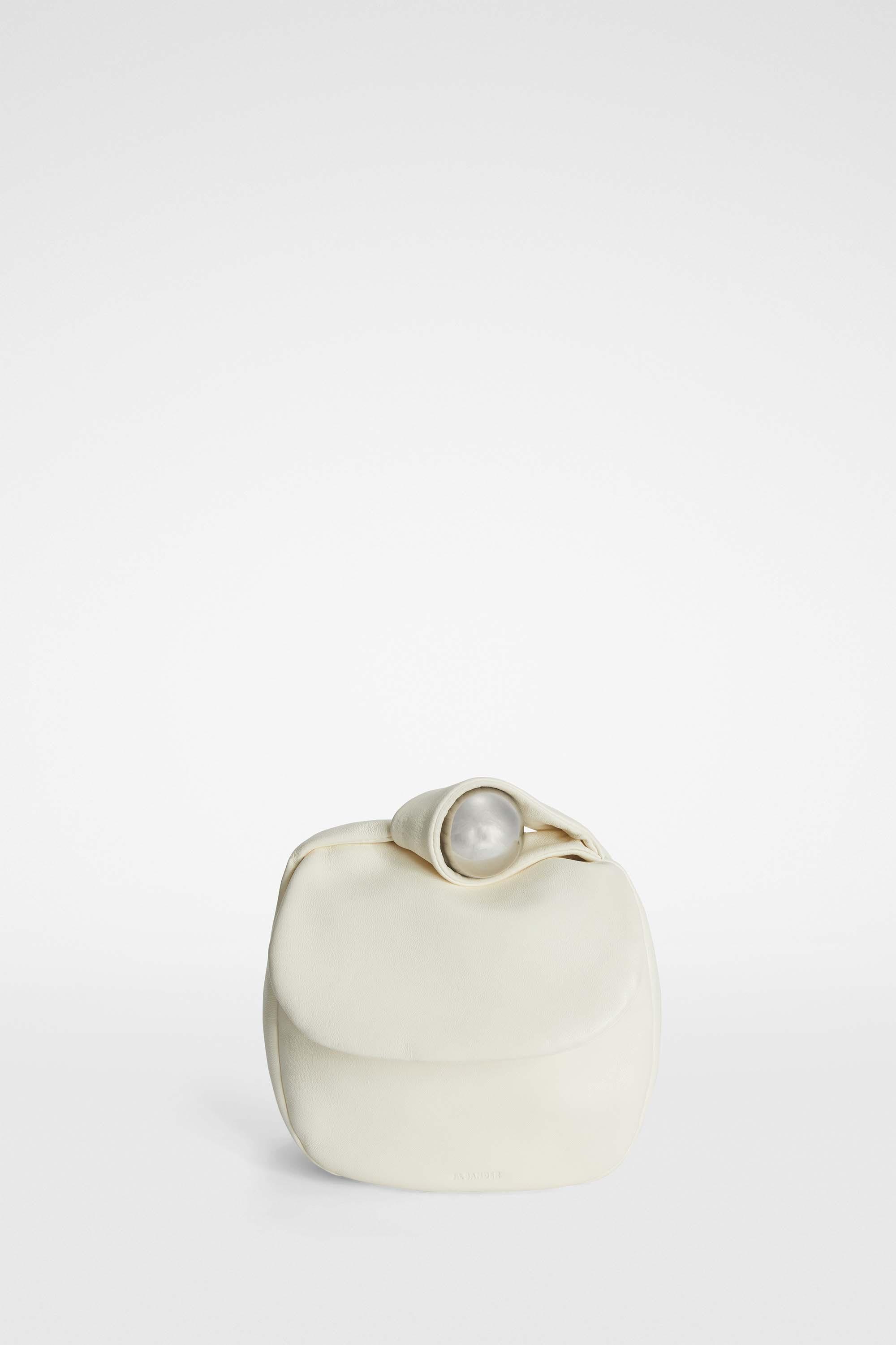 Jil Sander（ジル・サンダー）のホワイトクラッチバッグ /エッグシェル