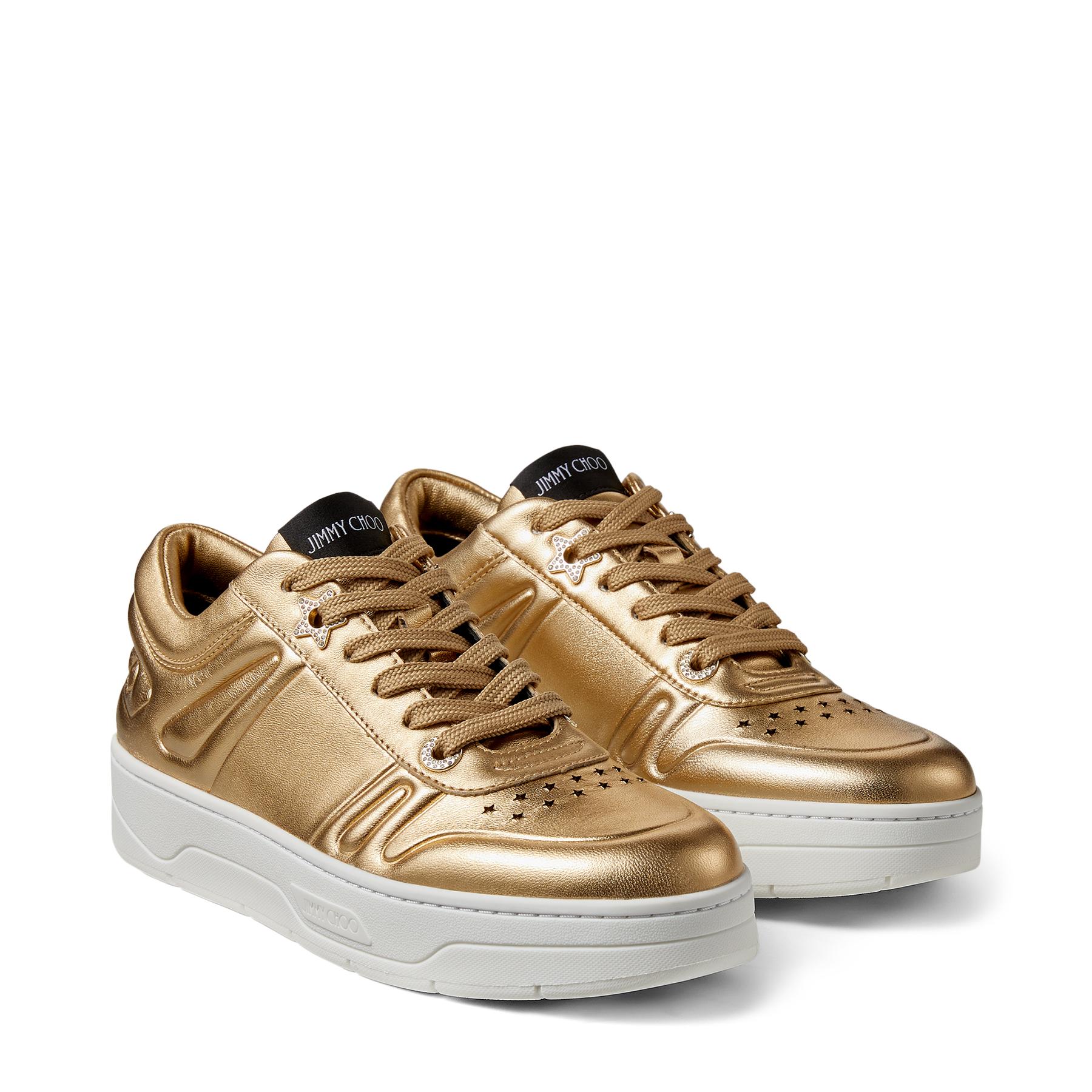 gold designer trainers